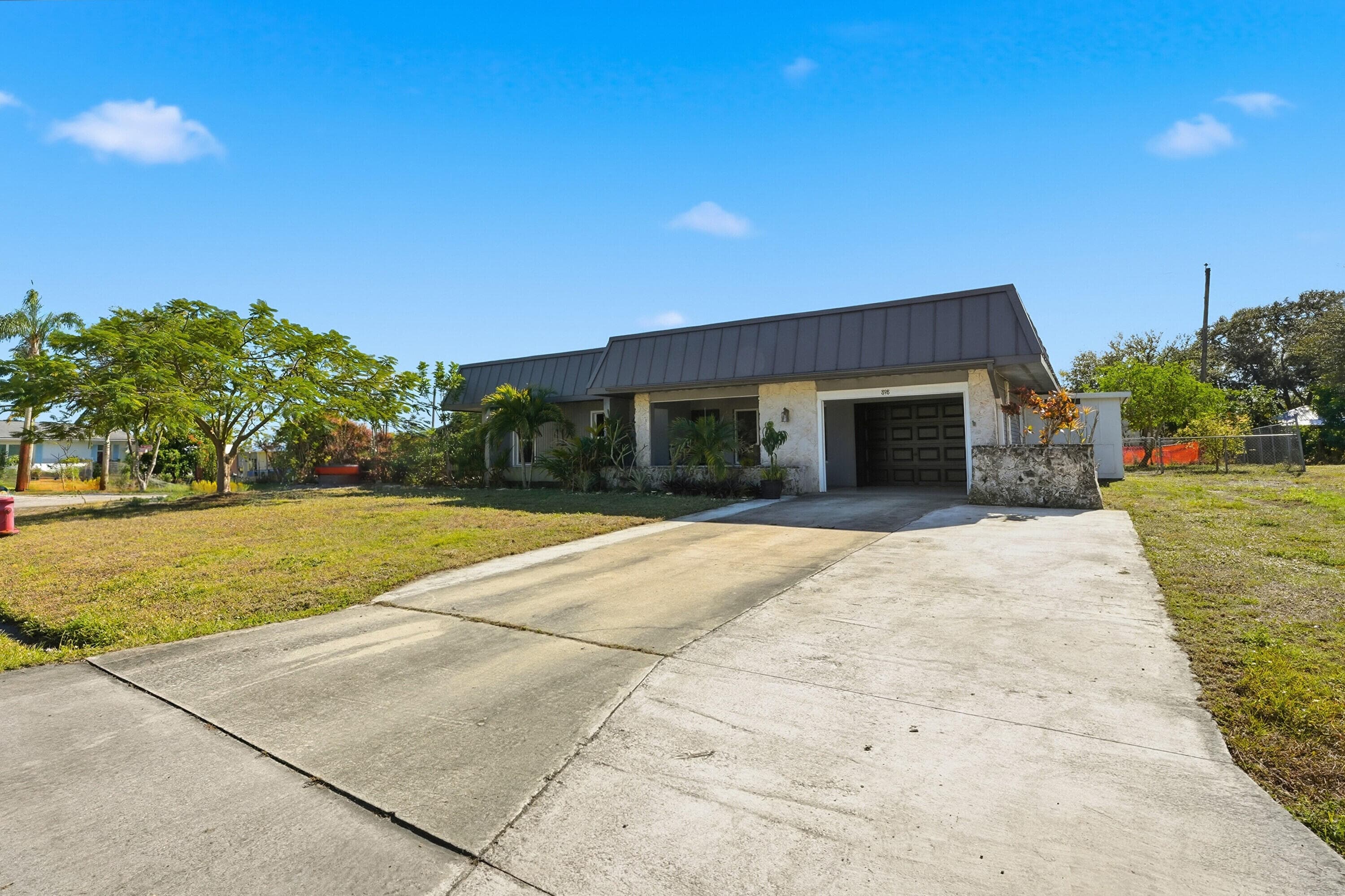 898 SE Evergreen Terrace, Port St. Lucie, FL 34983 — photo 4 of 46