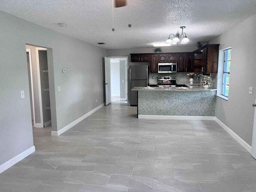 2410 S Brocksmith Road, Fort Pierce, FL 34945 — photo 11 of 65