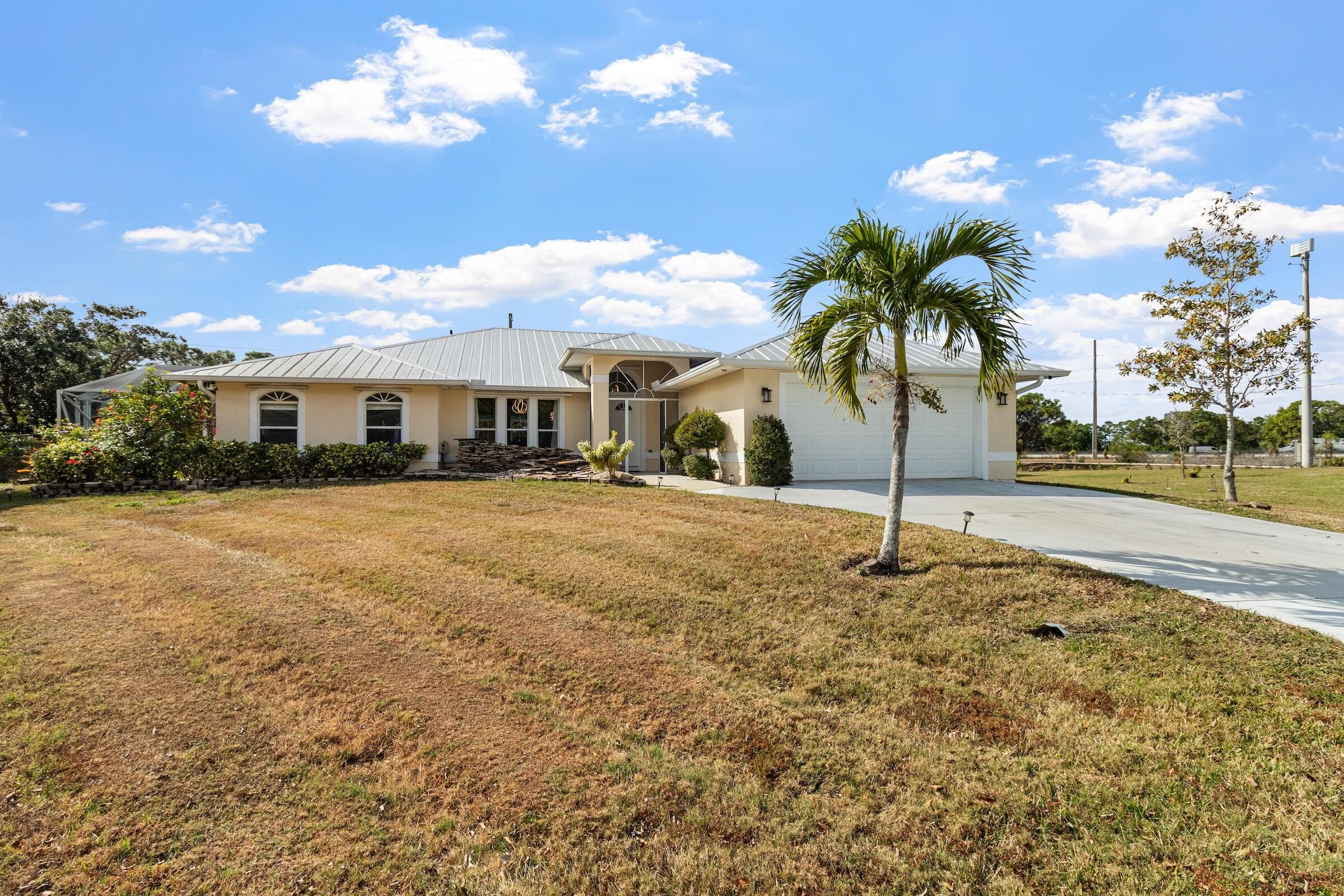 4661 NW Bogi Court, Port St. Lucie, FL 34983 — photo 1 of 46