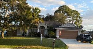 1586 SW Herder Road, Port St. Lucie, FL 34953 — photo 1 of 21