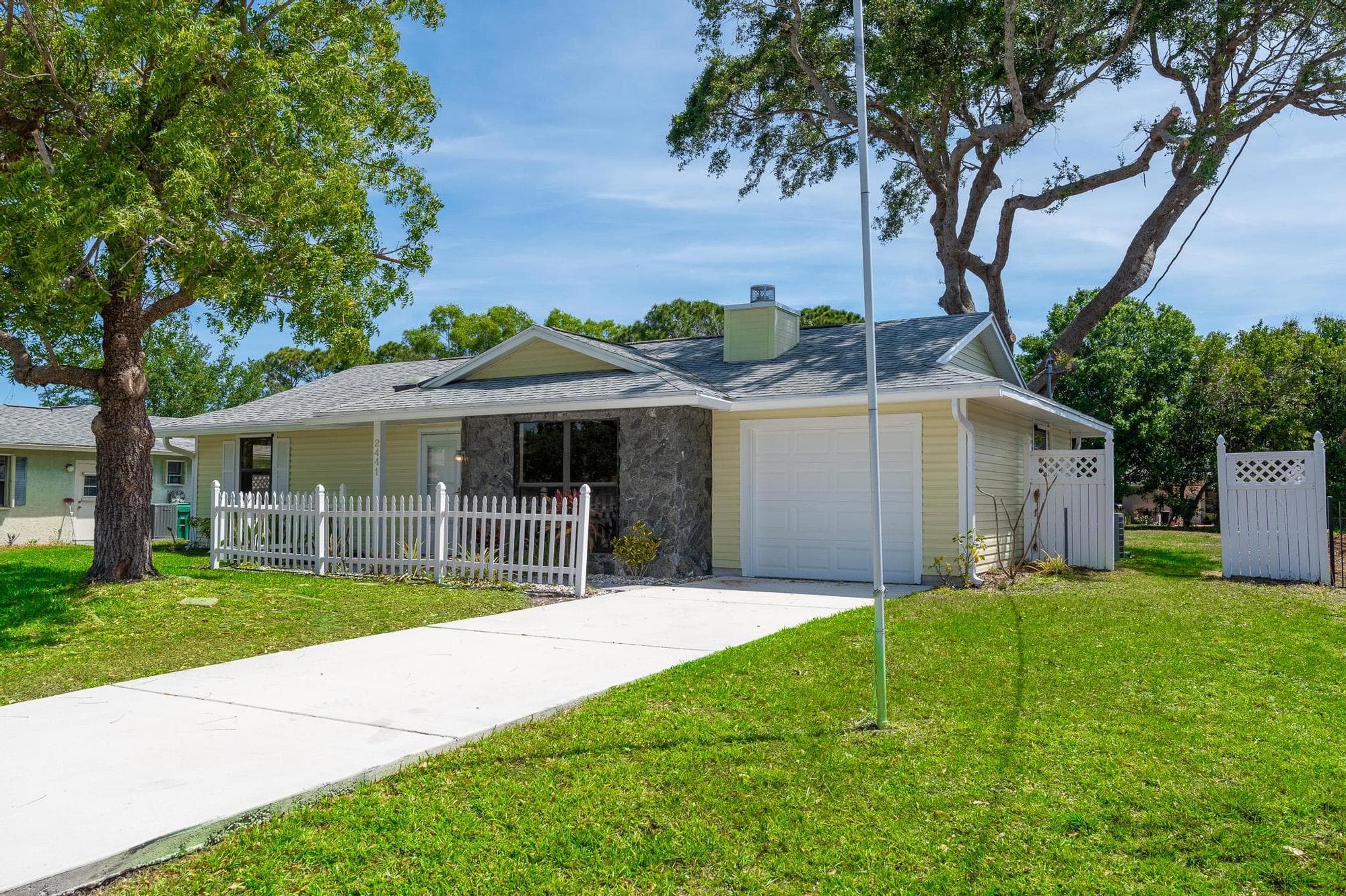 2441 SE Avalon Road, Port St. Lucie, FL 34952 — photo 1 of 43