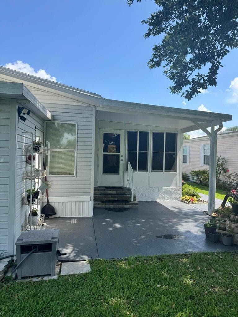 14119 Isla Flores Avenue, Fort Pierce, FL 34951 — photo 3 of 40