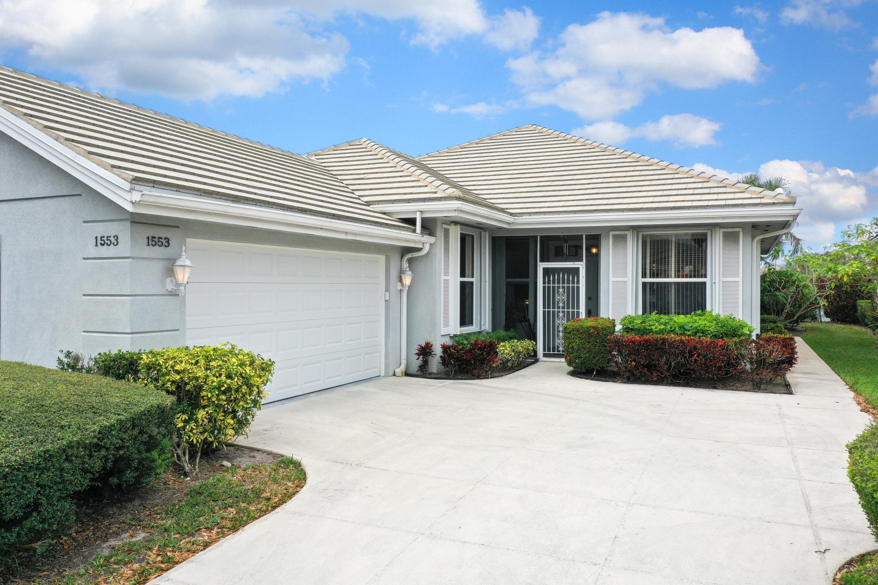 1553 NW Amherst Drive, Port St. Lucie, FL 34986 — photo 1 of 48