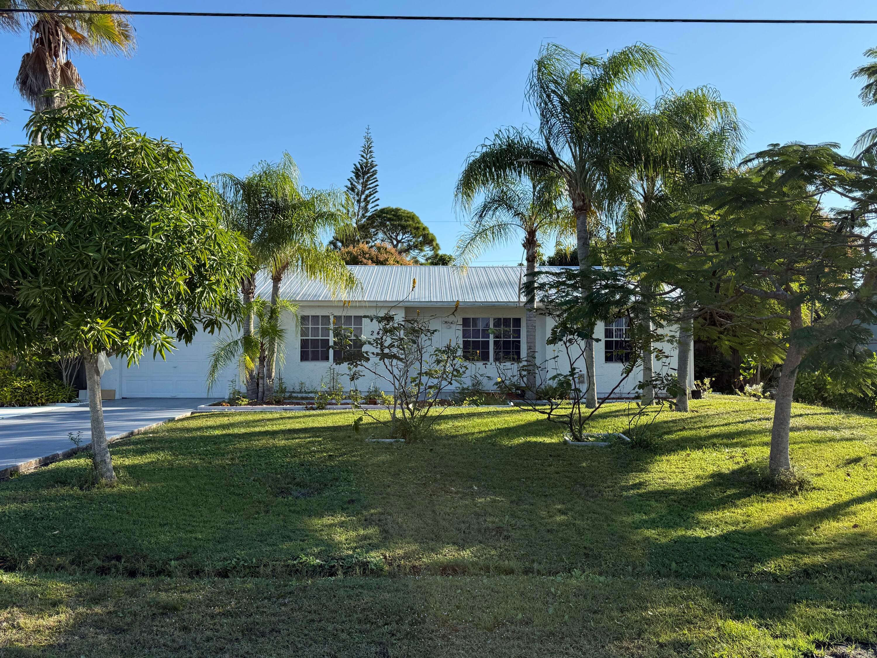 2451 SE Berkshire Boulevard, Port St. Lucie, FL 34952 — photo 1 of 19