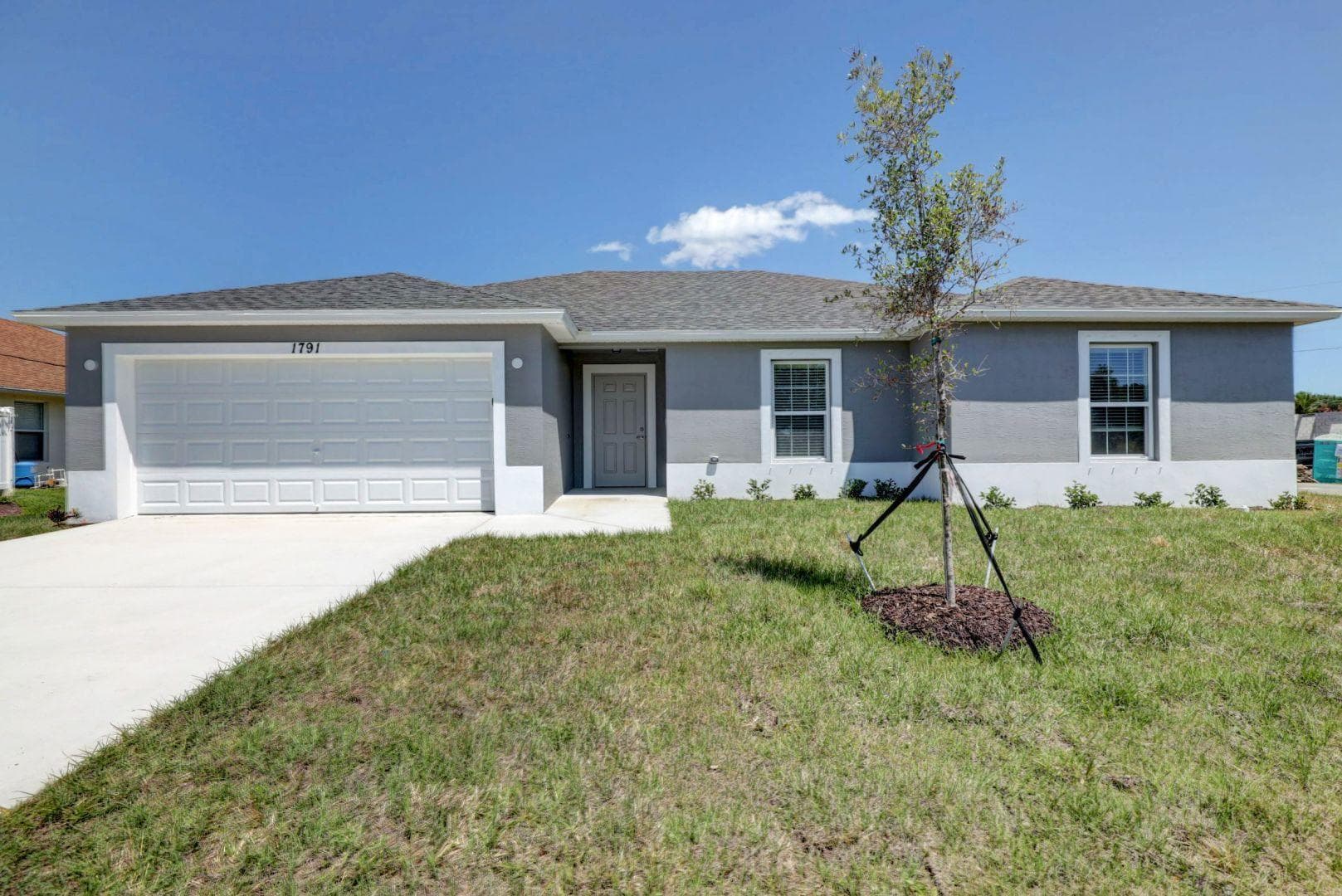 381 SW Todd Avenue, Port St. Lucie, FL 34983 — photo 1 of 55