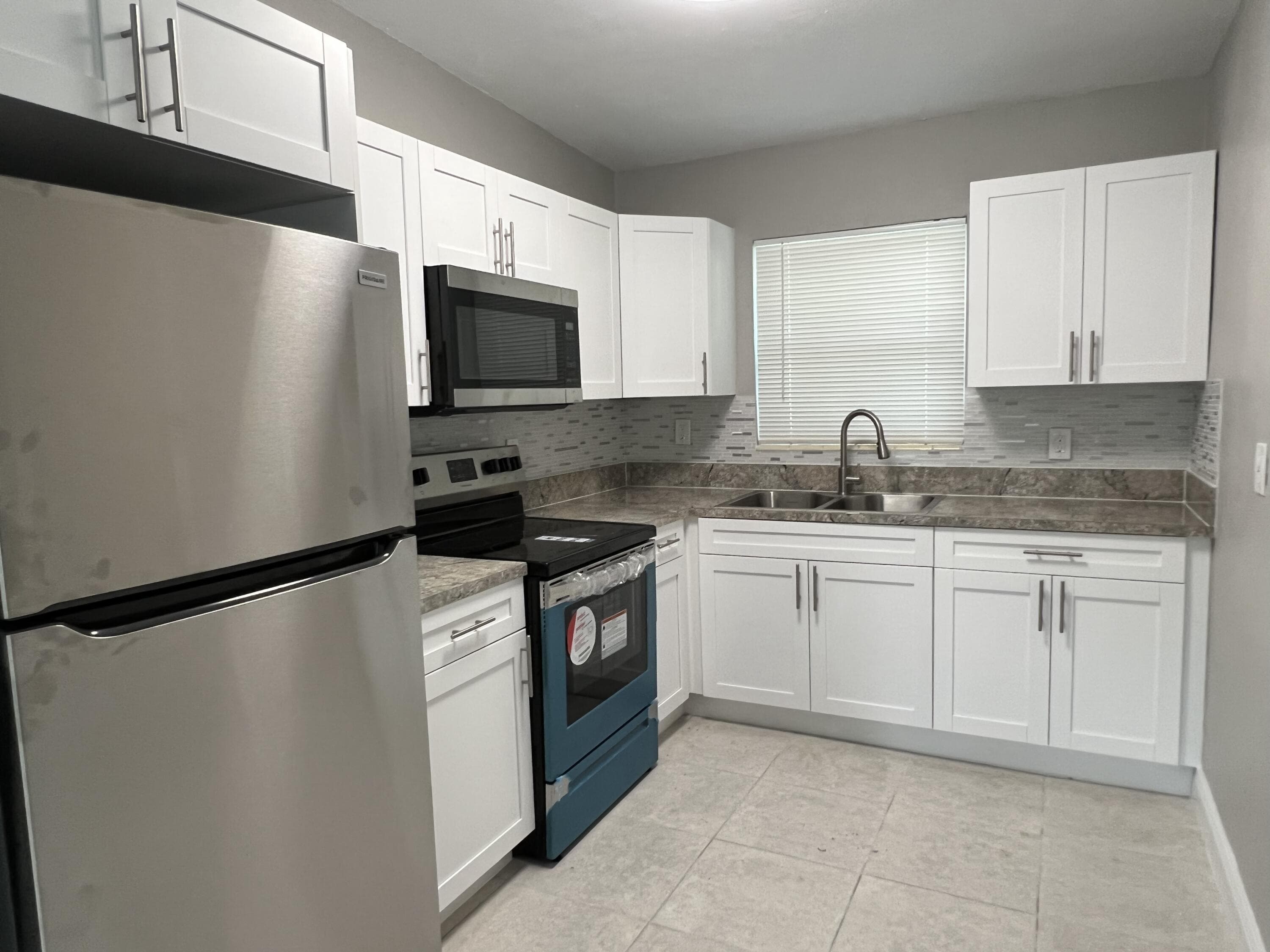 3990 Plum Tree Drive, Lake Worth, FL 33462 — photo 1 of 14