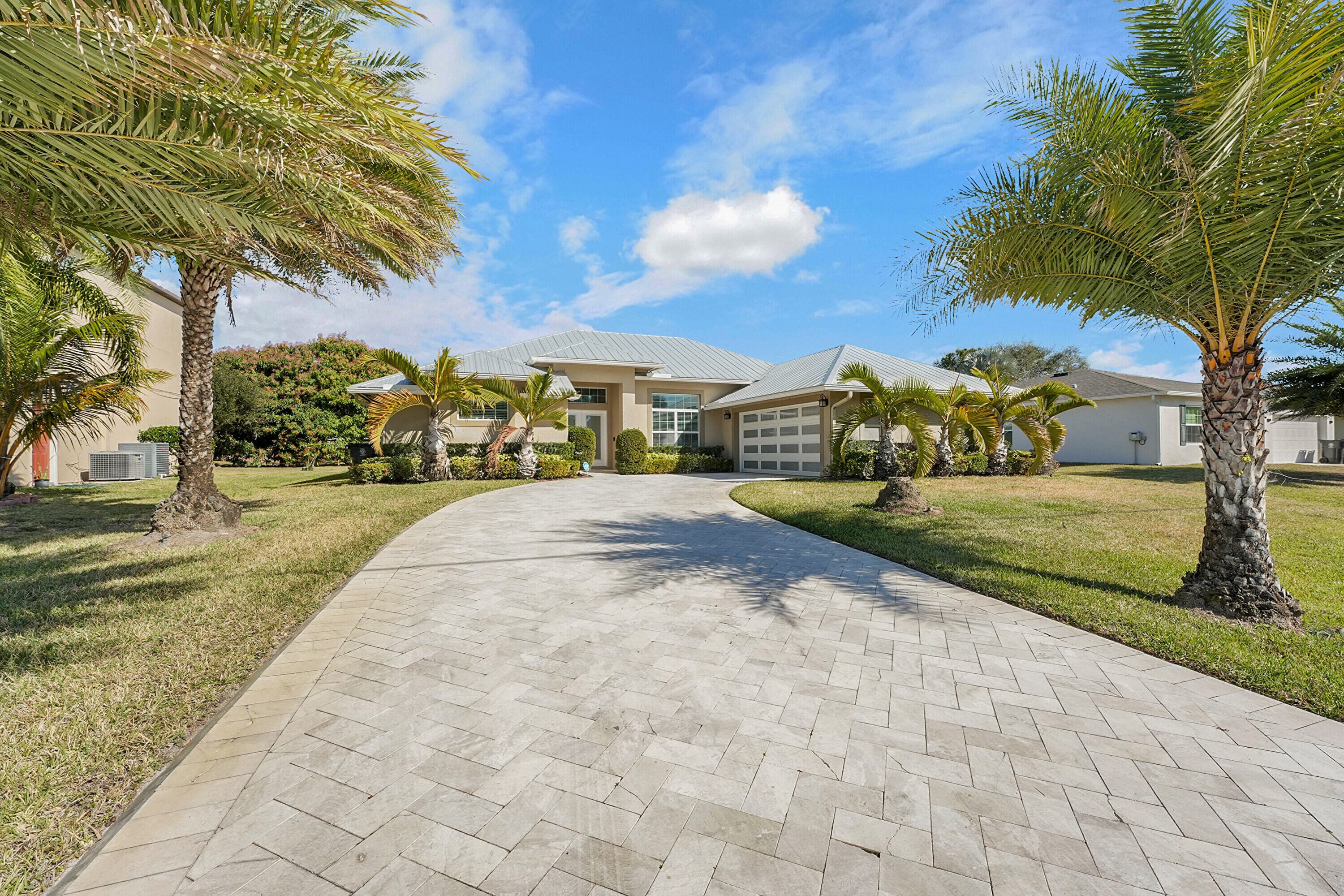 1265 SW Milan Lane, Port St. Lucie, FL 34953 — photo 1 of 44