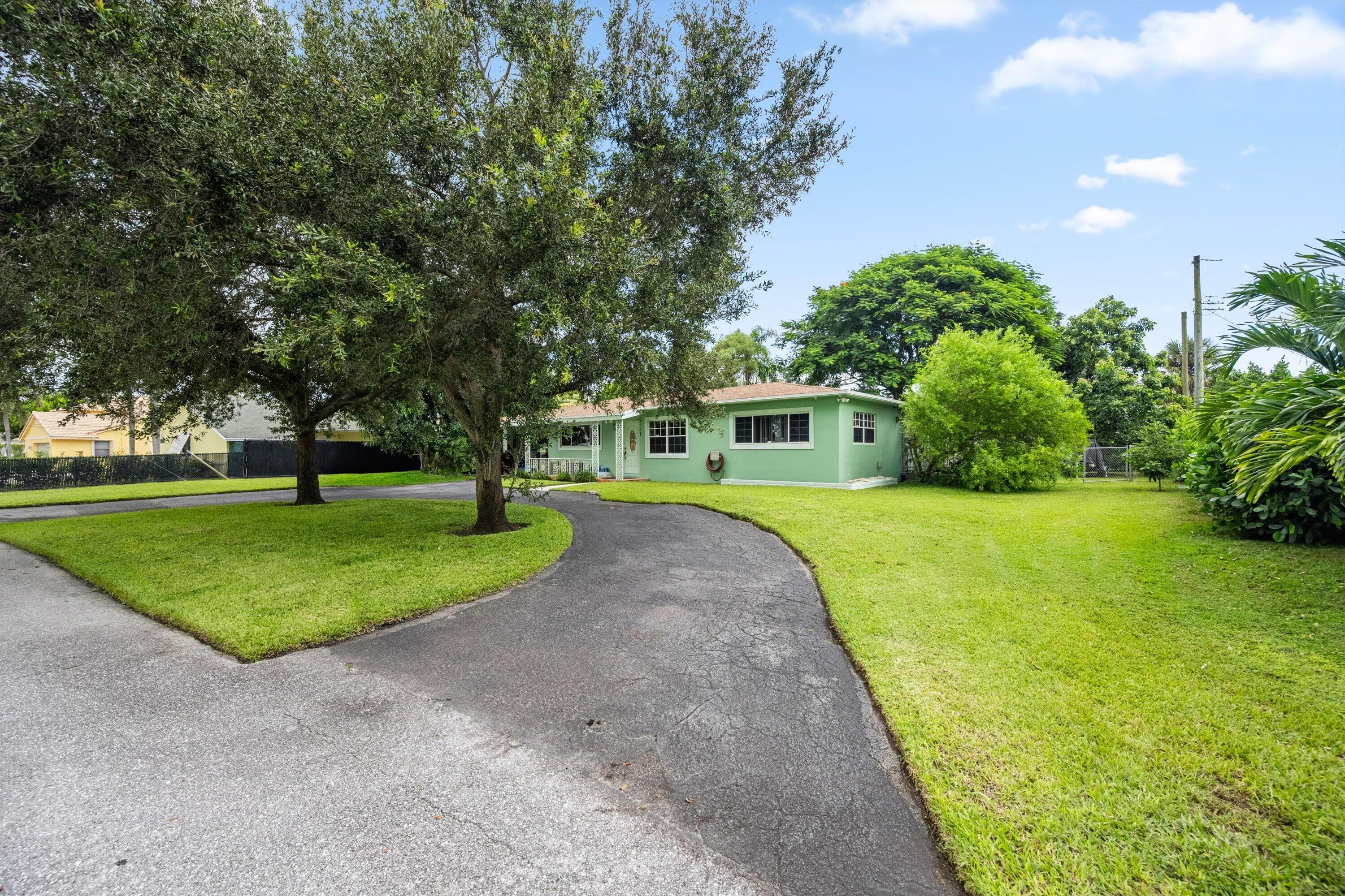 6400 Carambola Circle, West Palm Beach, FL 33406 — photo 1 of 11