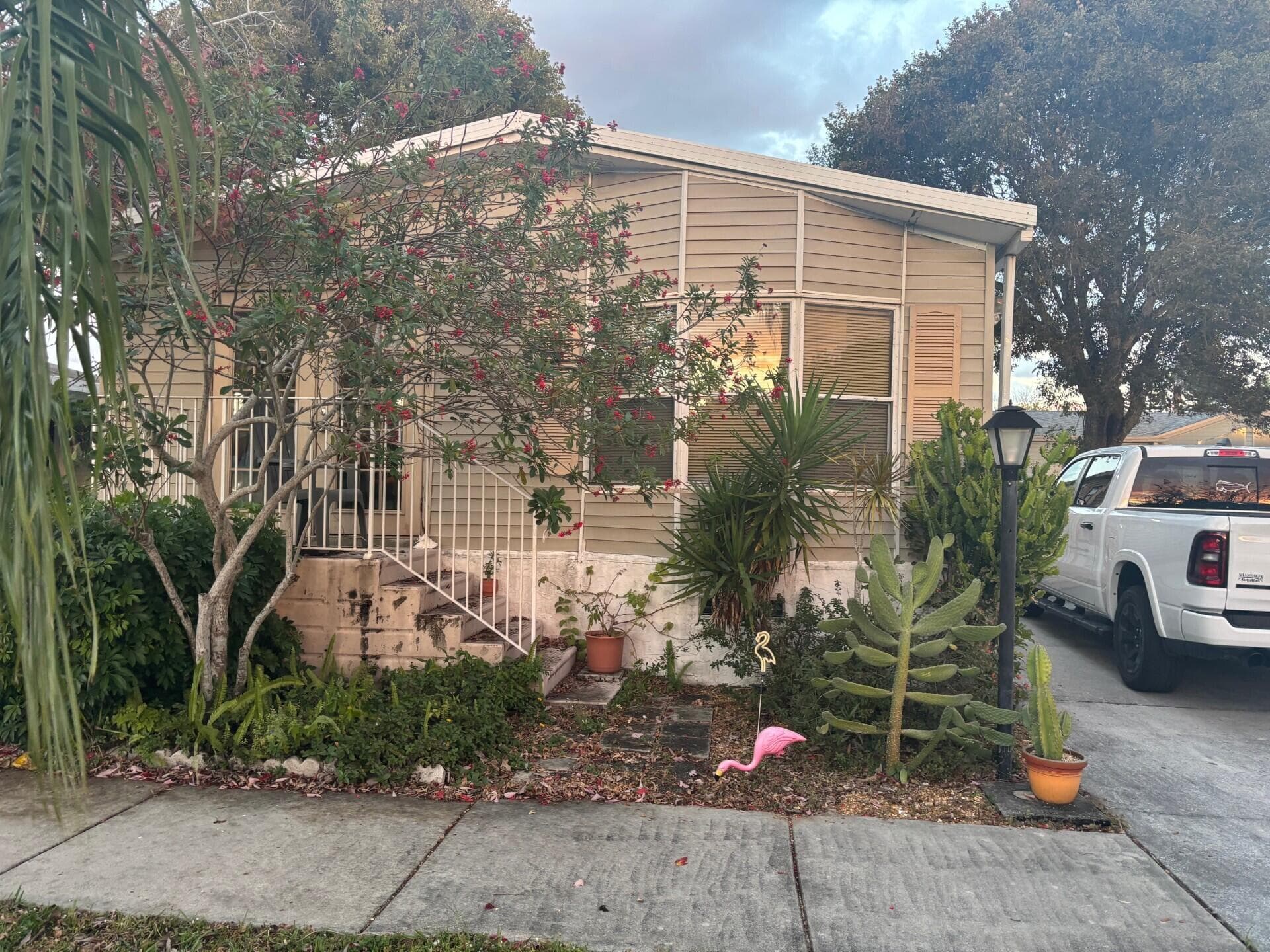 6566 NW 34th Ave Lot#H009 Avenue, Coconut Creek, FL 33073 — photo 1 of 25