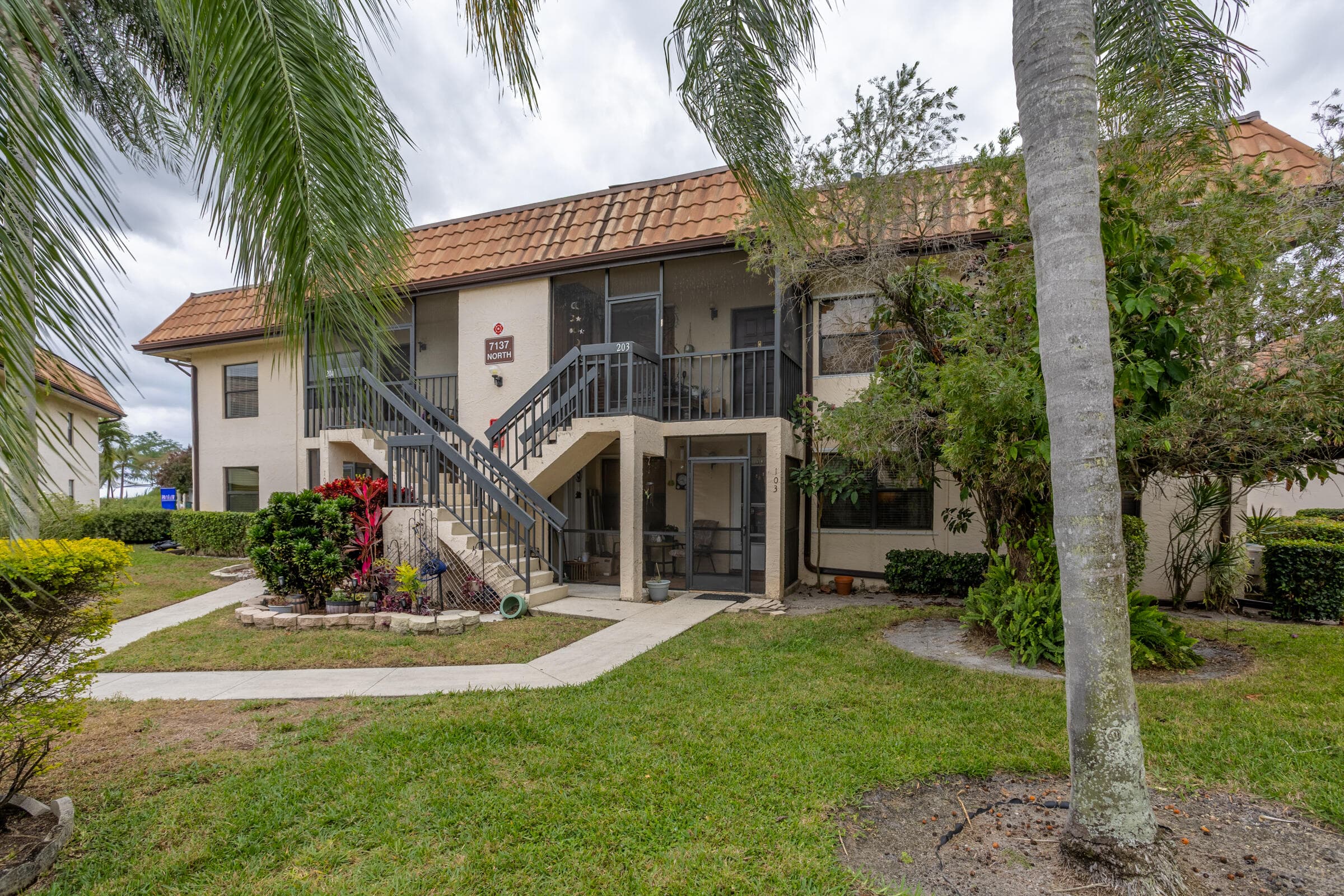 7137 Golf Colony Court 103, Lake Worth, FL 33467 — photo 1 of 19