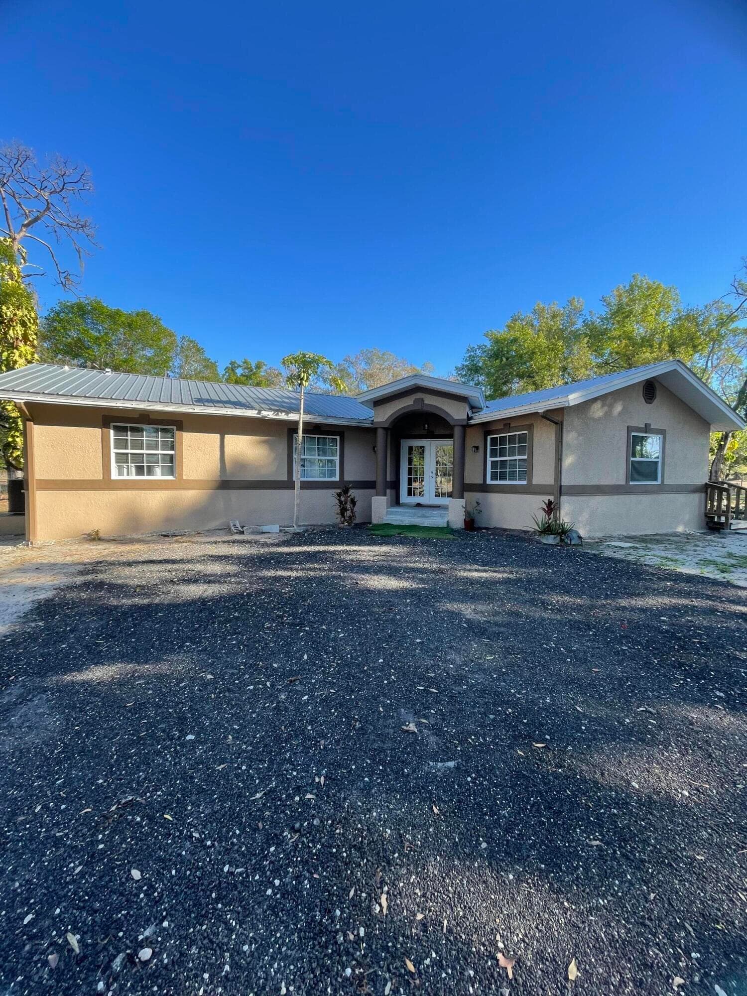 1220 A Road, LaBelle, FL 33935 — photo 1 of 42