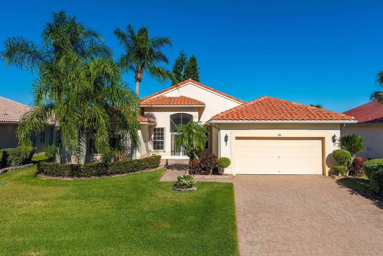 486 NW Blue Lake Drive, Port St. Lucie, FL 34986 — photo 1 of 66