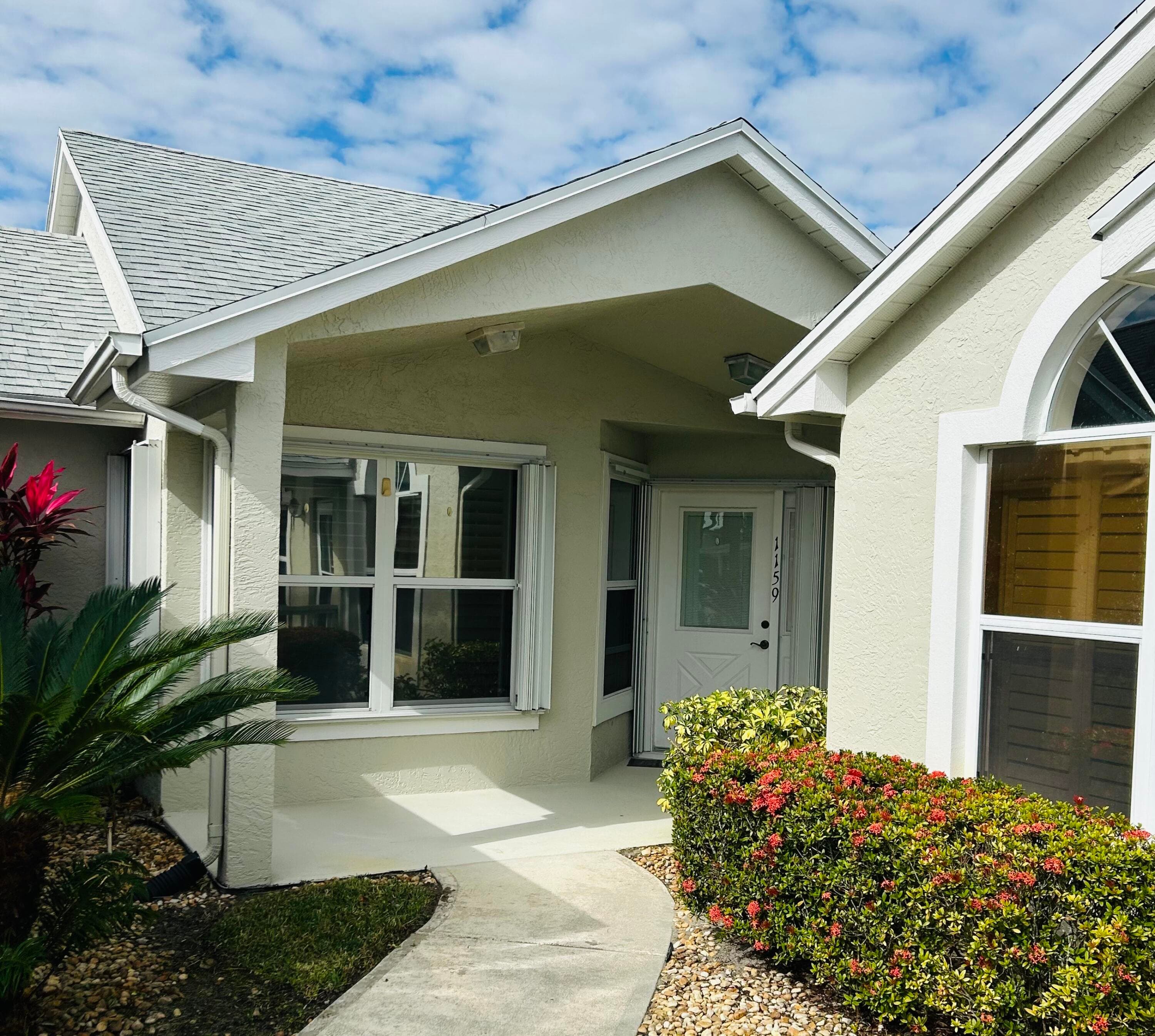 1159 NW Lombardy Drive, Port St. Lucie, FL 34986 — photo 1 of 17