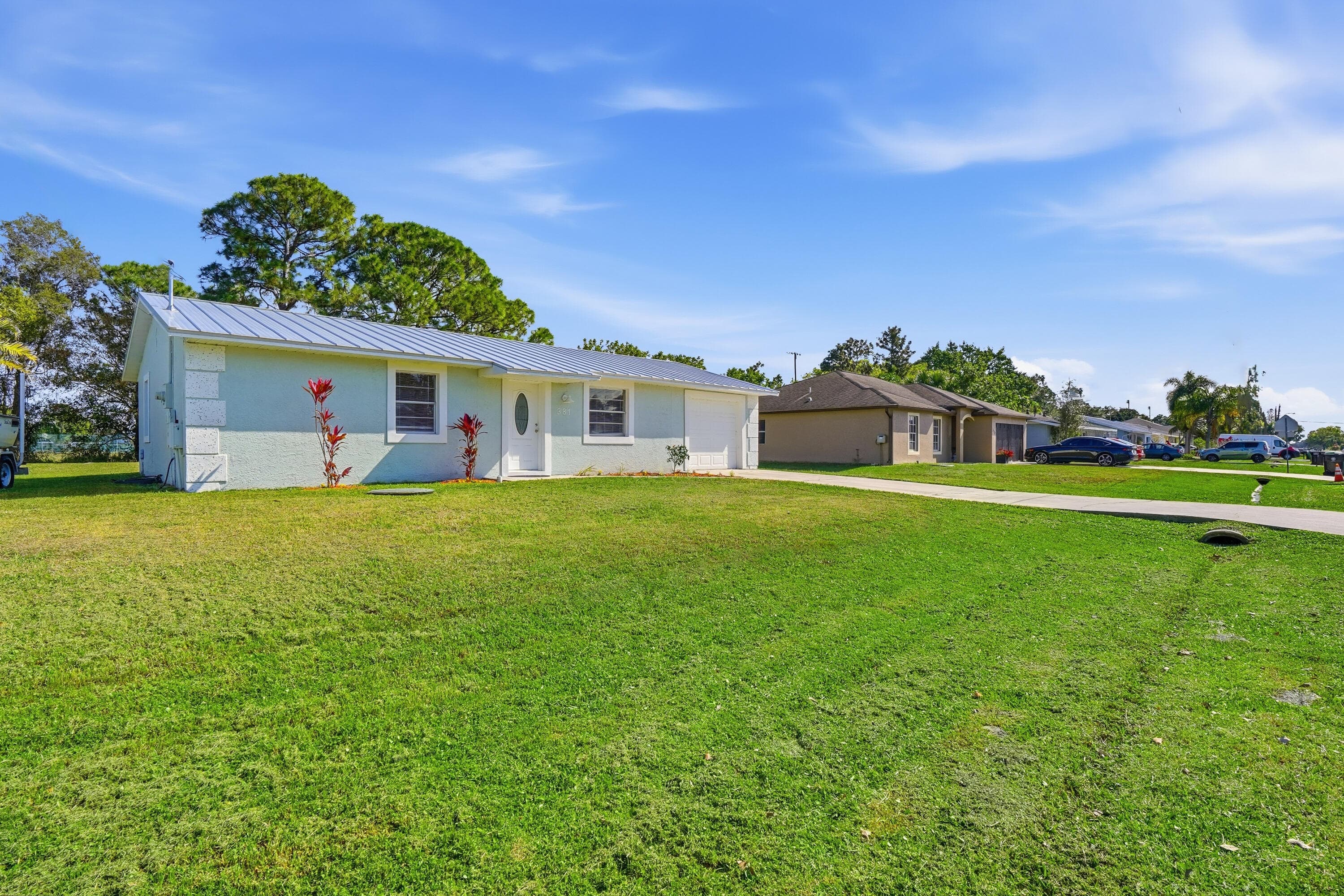 381 NW Curtis Street, Port St. Lucie, FL 34983 — photo 1 of 36