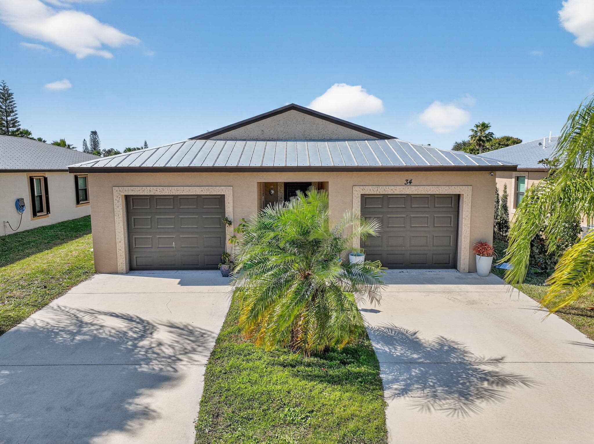 34 Nogales Way, Port St. Lucie, FL 34952 — photo 1 of 56