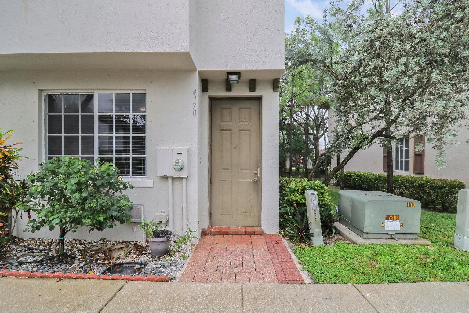 4170 Napoli Lake Drive, Riviera Beach, FL 33410 — photo 2 of 36