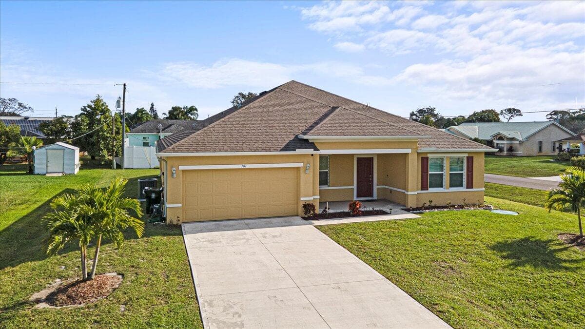 701 NE Perch Lane, Port St. Lucie, FL 34983 — photo 1 of 32