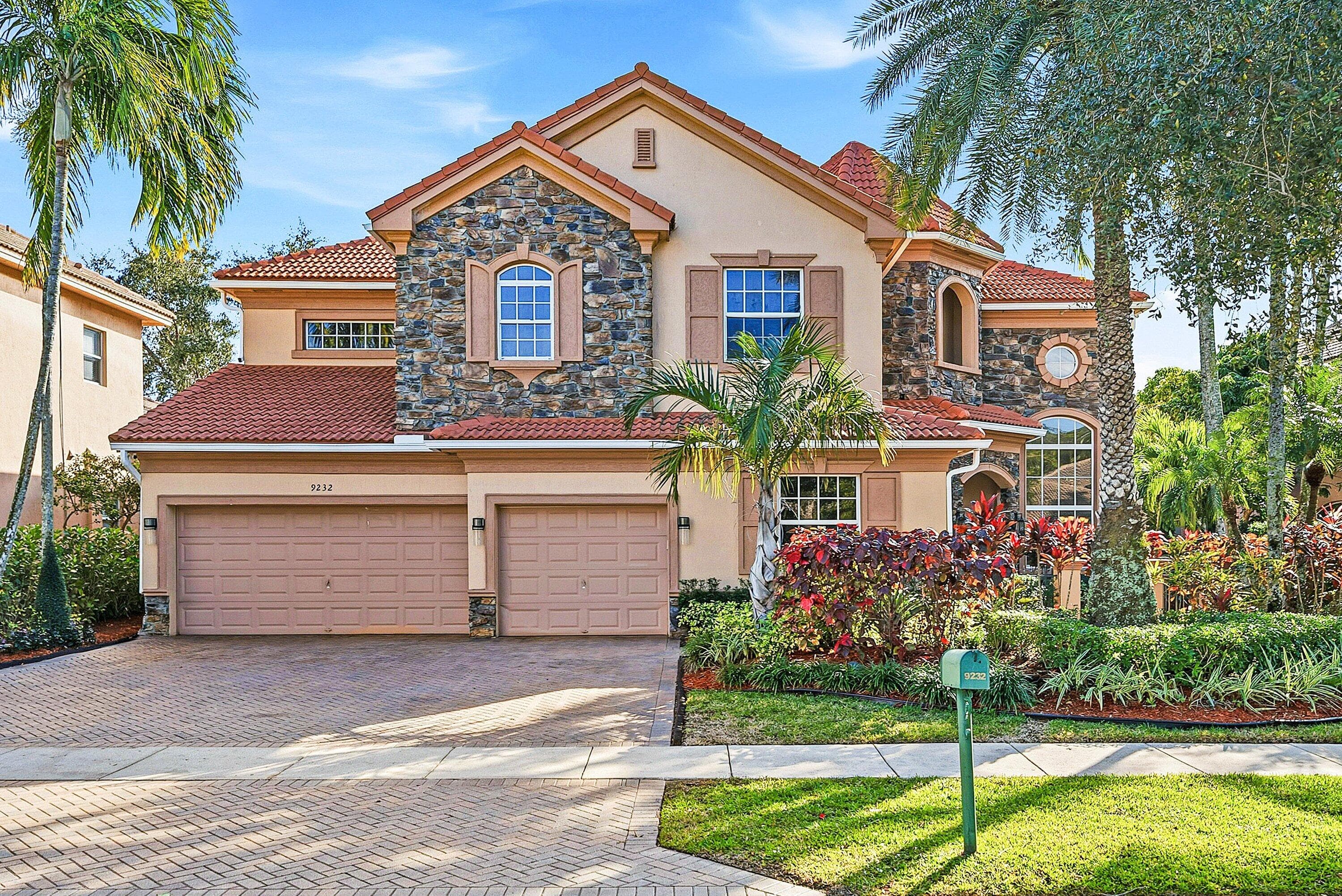 9232 Pineville Drive, Lake Worth, FL 33467 — photo 1 of 54
