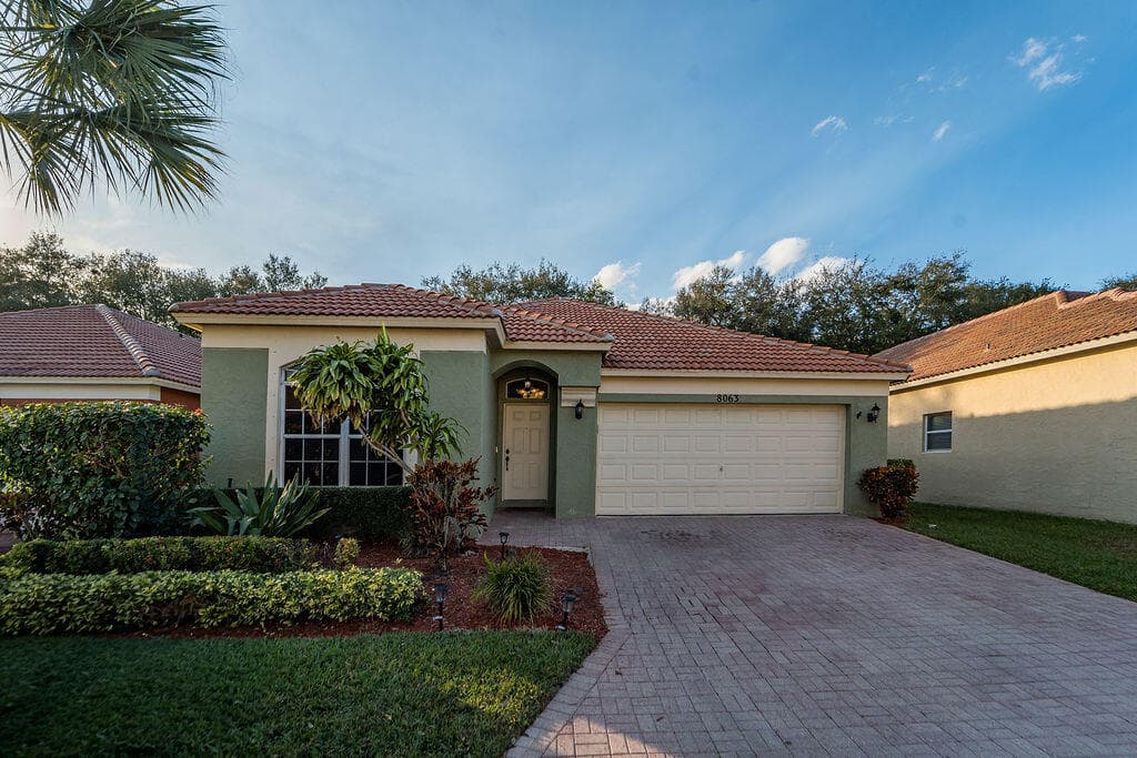 8063 Via Hacienda, Riviera Beach, FL 33418 — photo 1 of 42