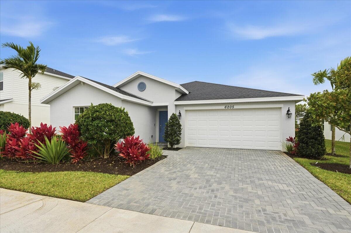 6205 NW Sweetwood Drive, Port St. Lucie, FL 34987 — photo 1 of 51