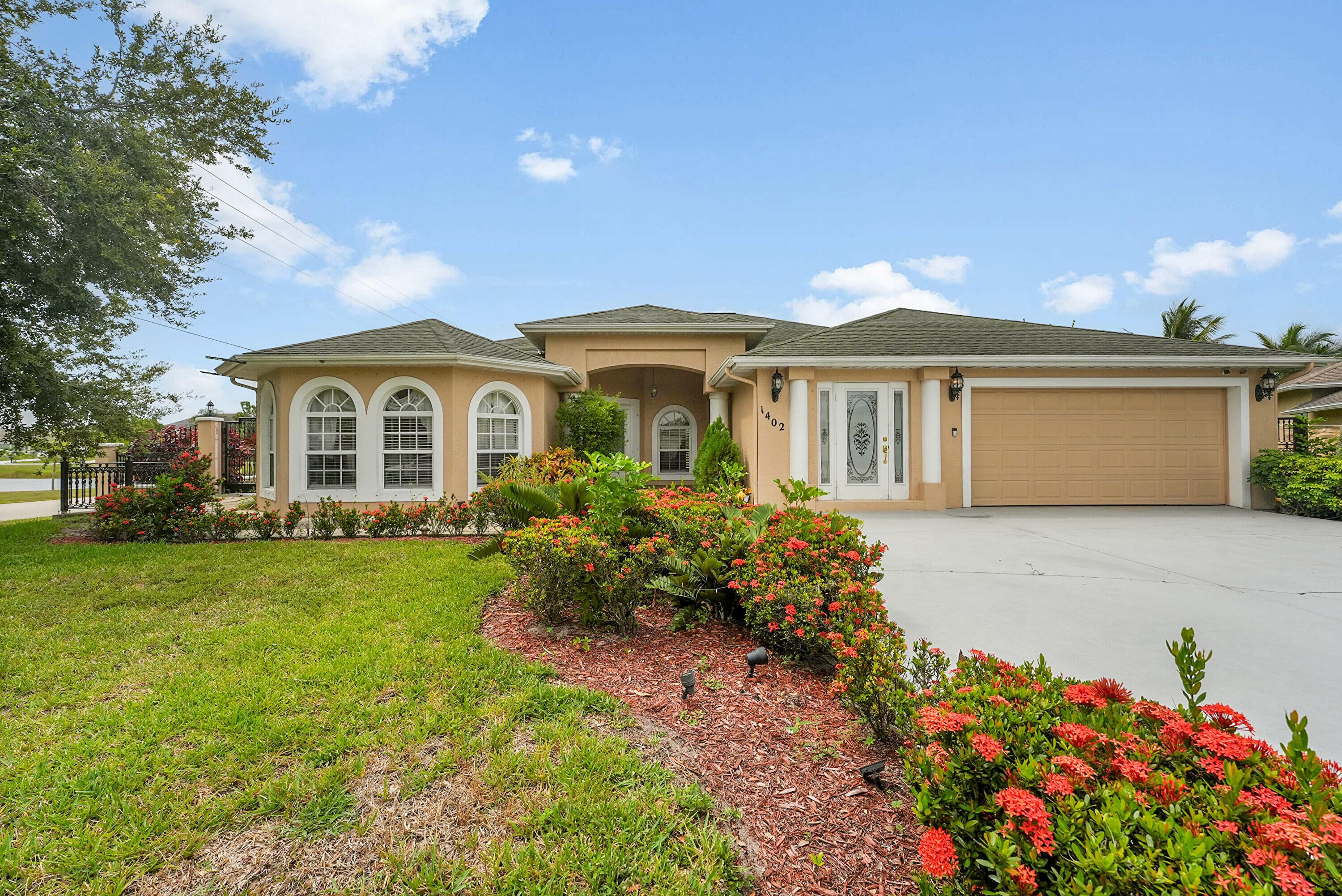 1402 SW Doe Court, Port St. Lucie, FL 34953 — photo 1 of 57