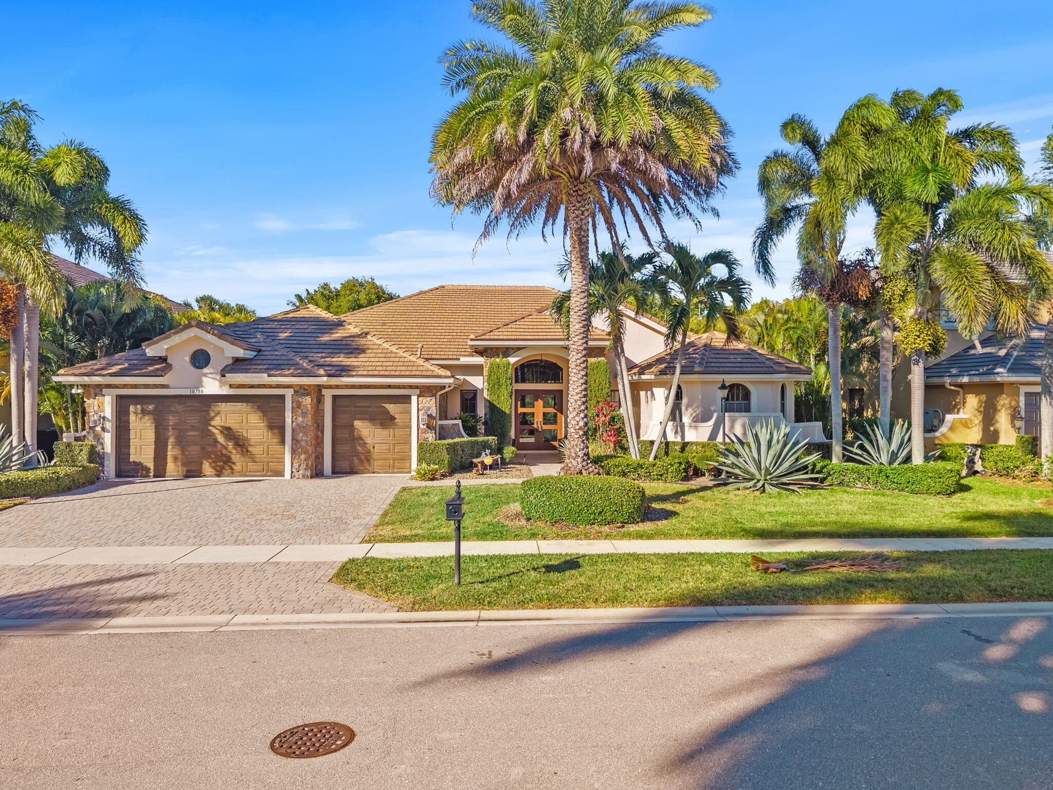 10710 Versailles Boulevard, Wellington, FL 33449 — photo 1 of 54