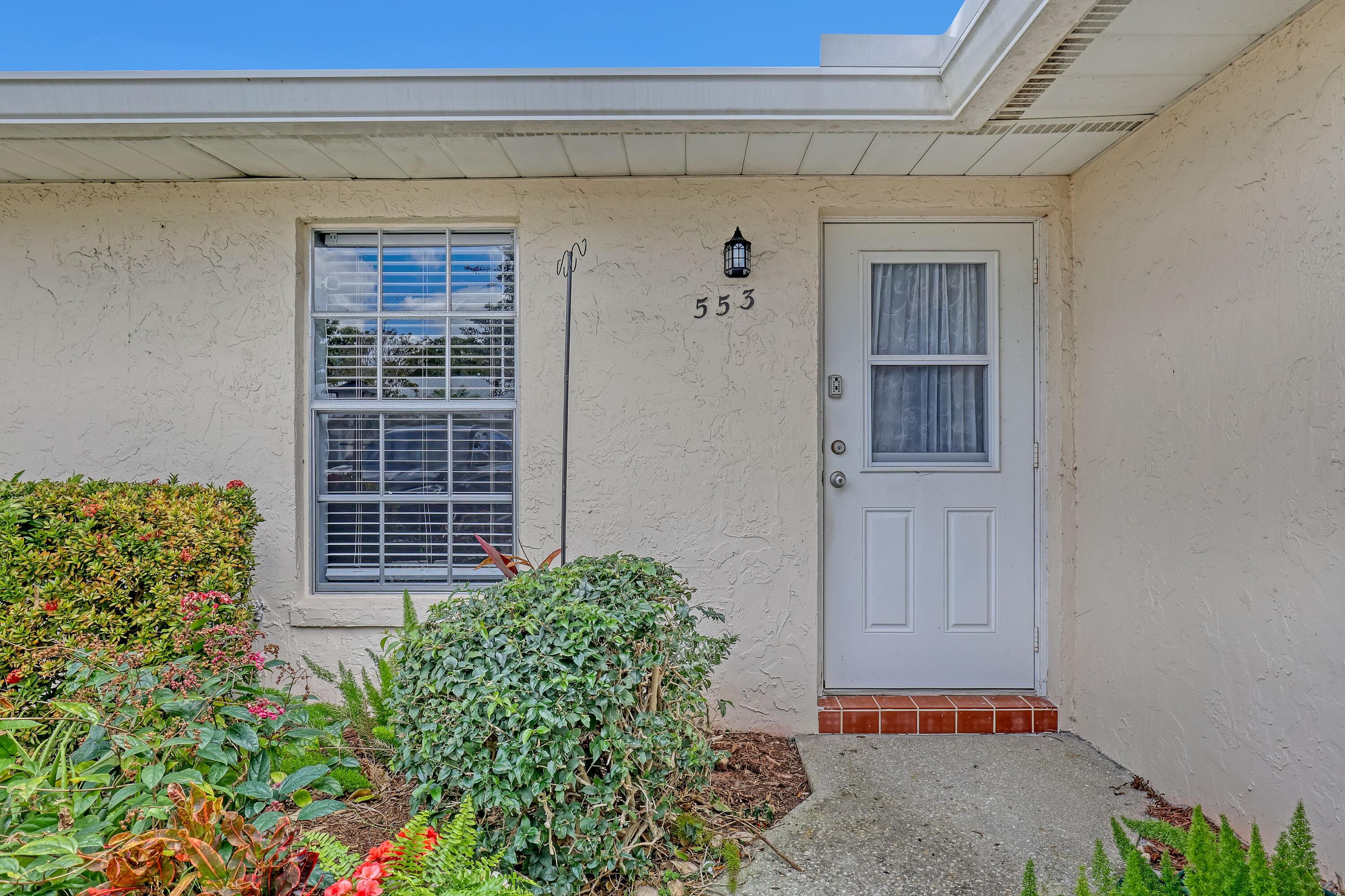 553 Covered Bridge Boulevard, Lake Worth, FL 33467 — photo 1 of 45