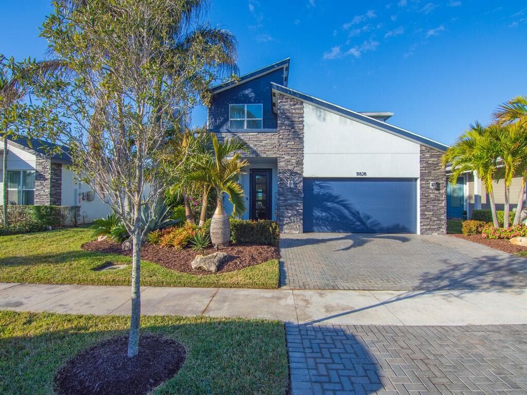 11828 SW Lyra Drive, Port St. Lucie, FL 34987 — photo 1 of 40