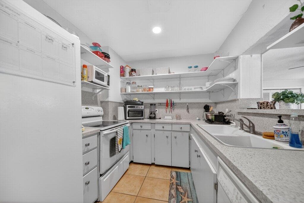 2427 NE Center Street, Jensen Beach, FL 34957 — photo 18 of 32