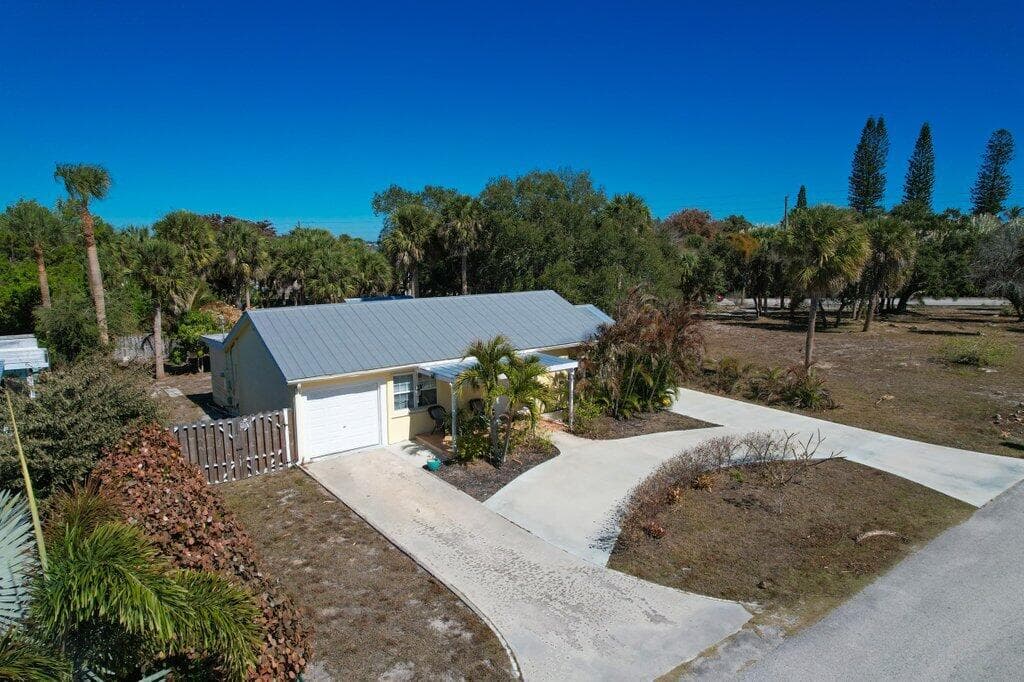 2427 NE Center Street, Jensen Beach, FL 34957 — photo 1 of 32