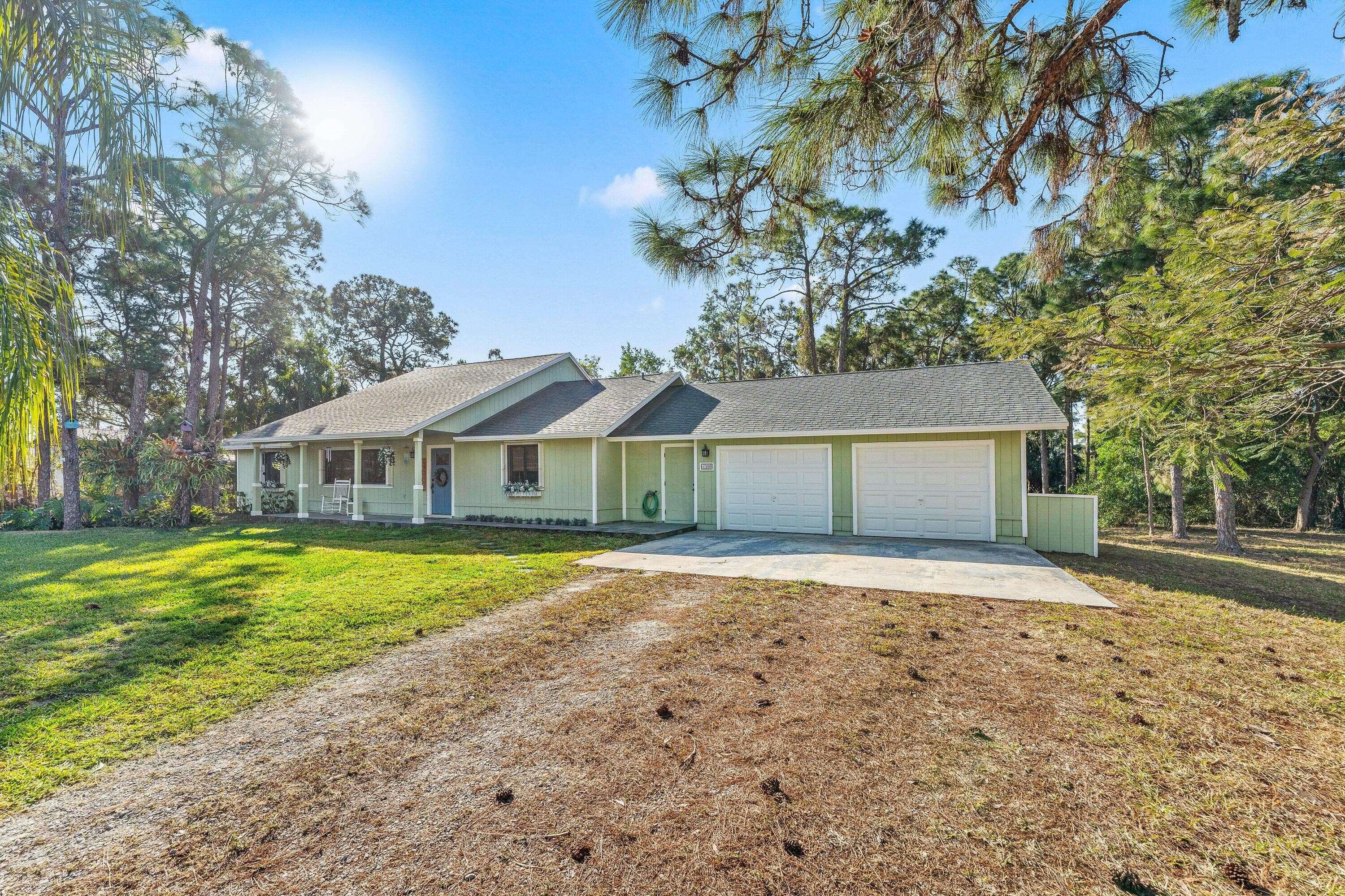 17956 46th Court N, The Acreage, FL 33470 — photo 2 of 49