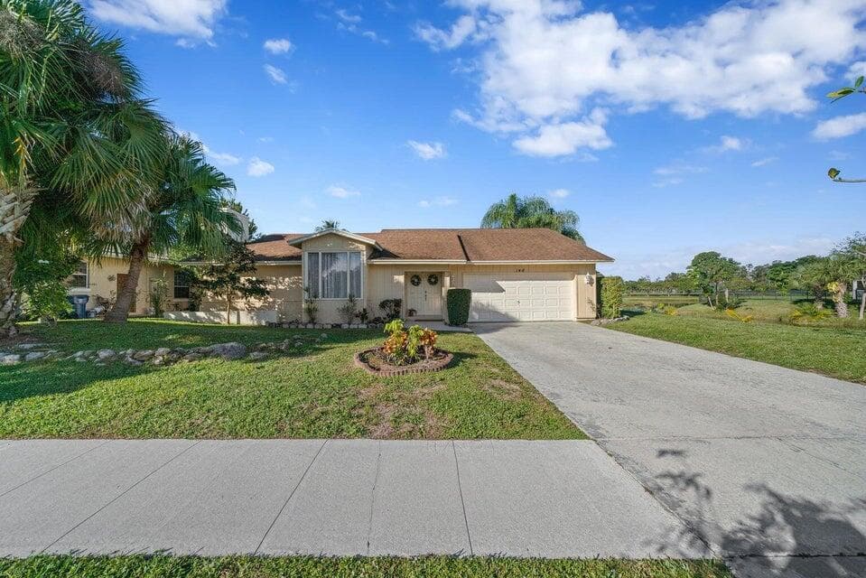 148 Ponce De Leon Street, Royal Palm Beach, FL 33411 — photo 1 of 14