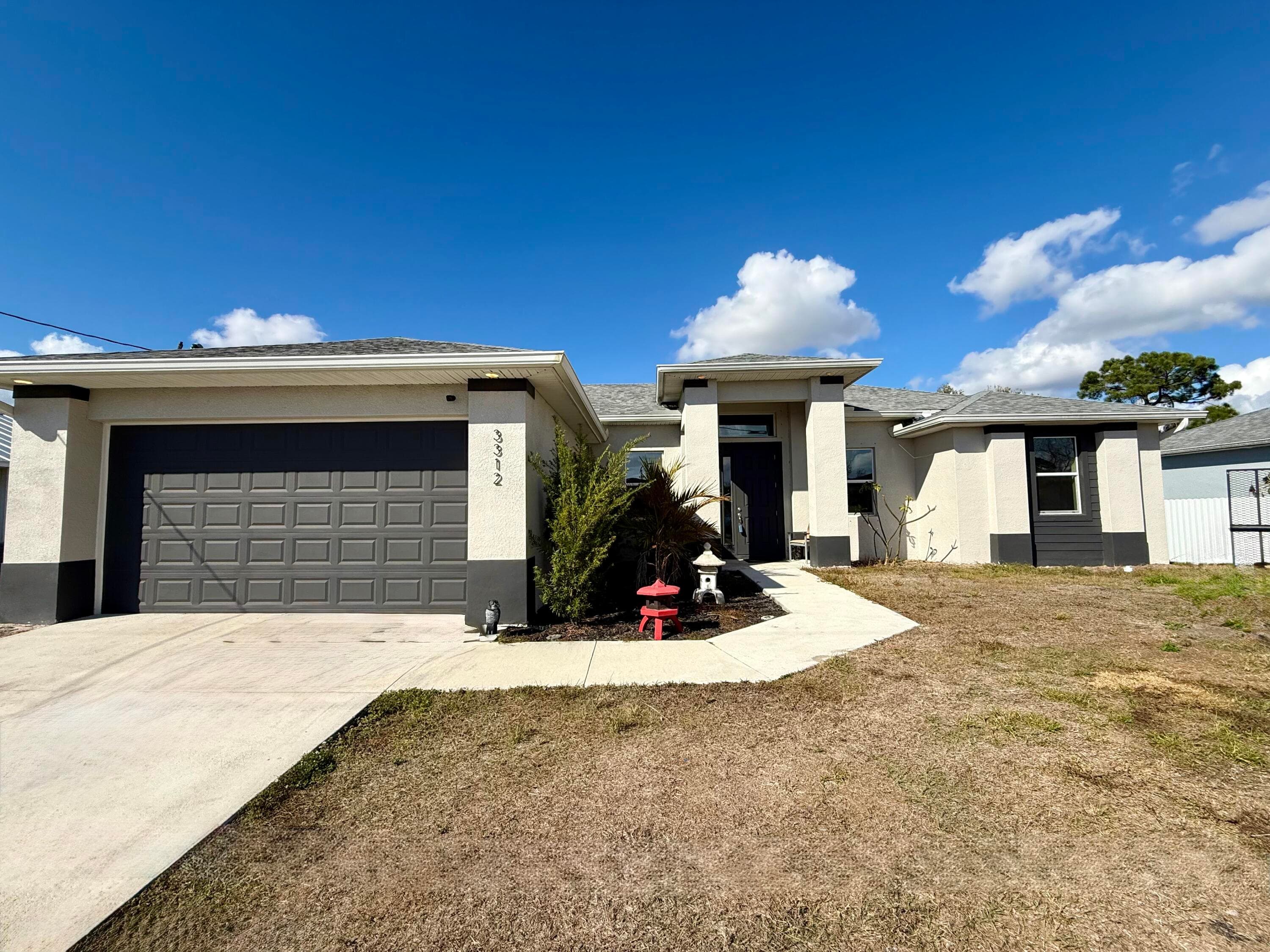 3312 16th Street W, Lehigh Acres, FL 33971 — photo 1 of 27