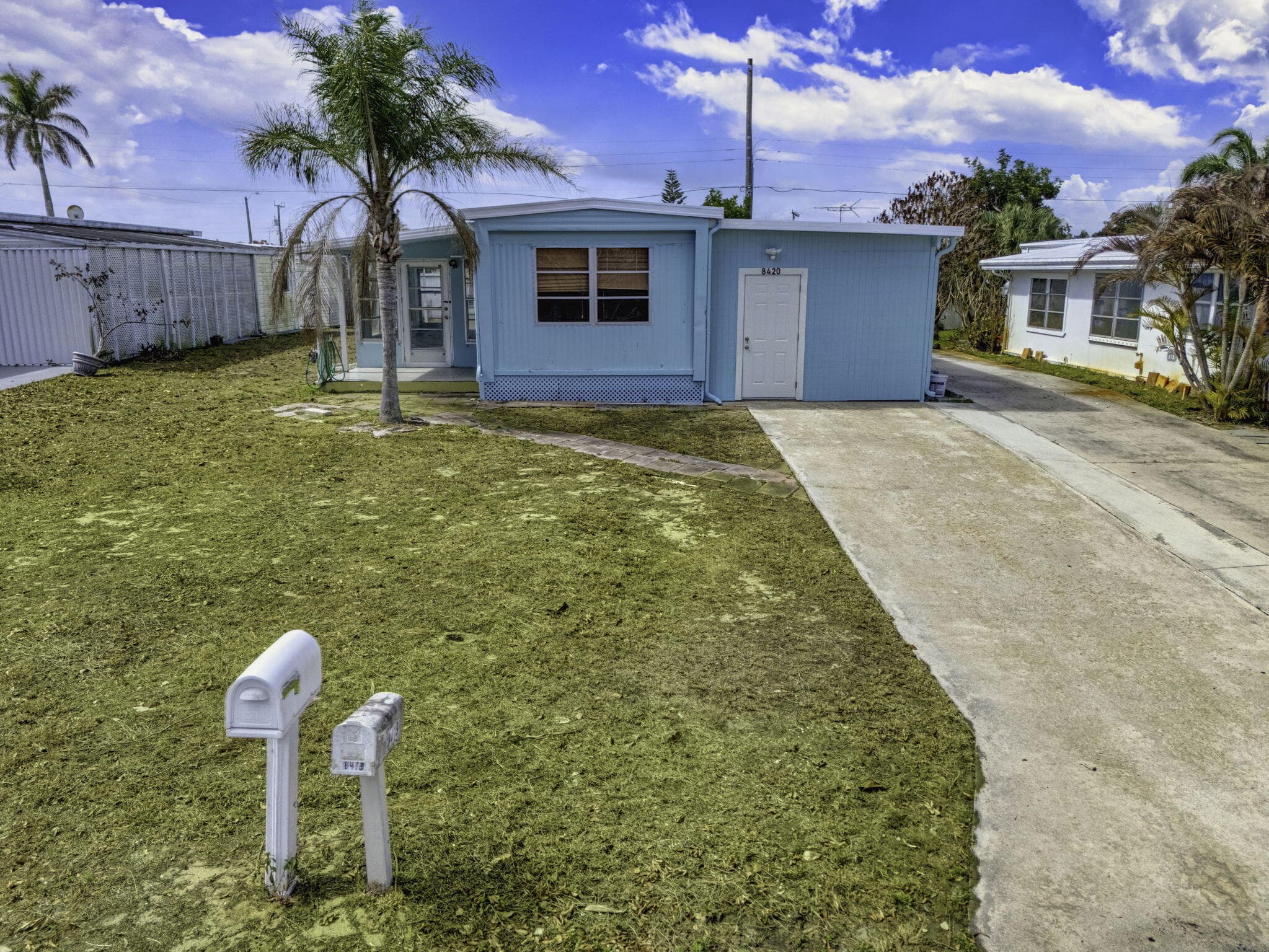 8420 SE Eagle Avenue, Hobe Sound, FL 33455 — photo 1 of 56