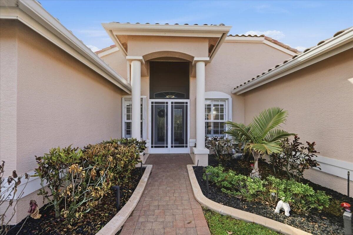 499 NW Blue Lake Drive, Port St. Lucie, FL 34986 — photo 2 of 44
