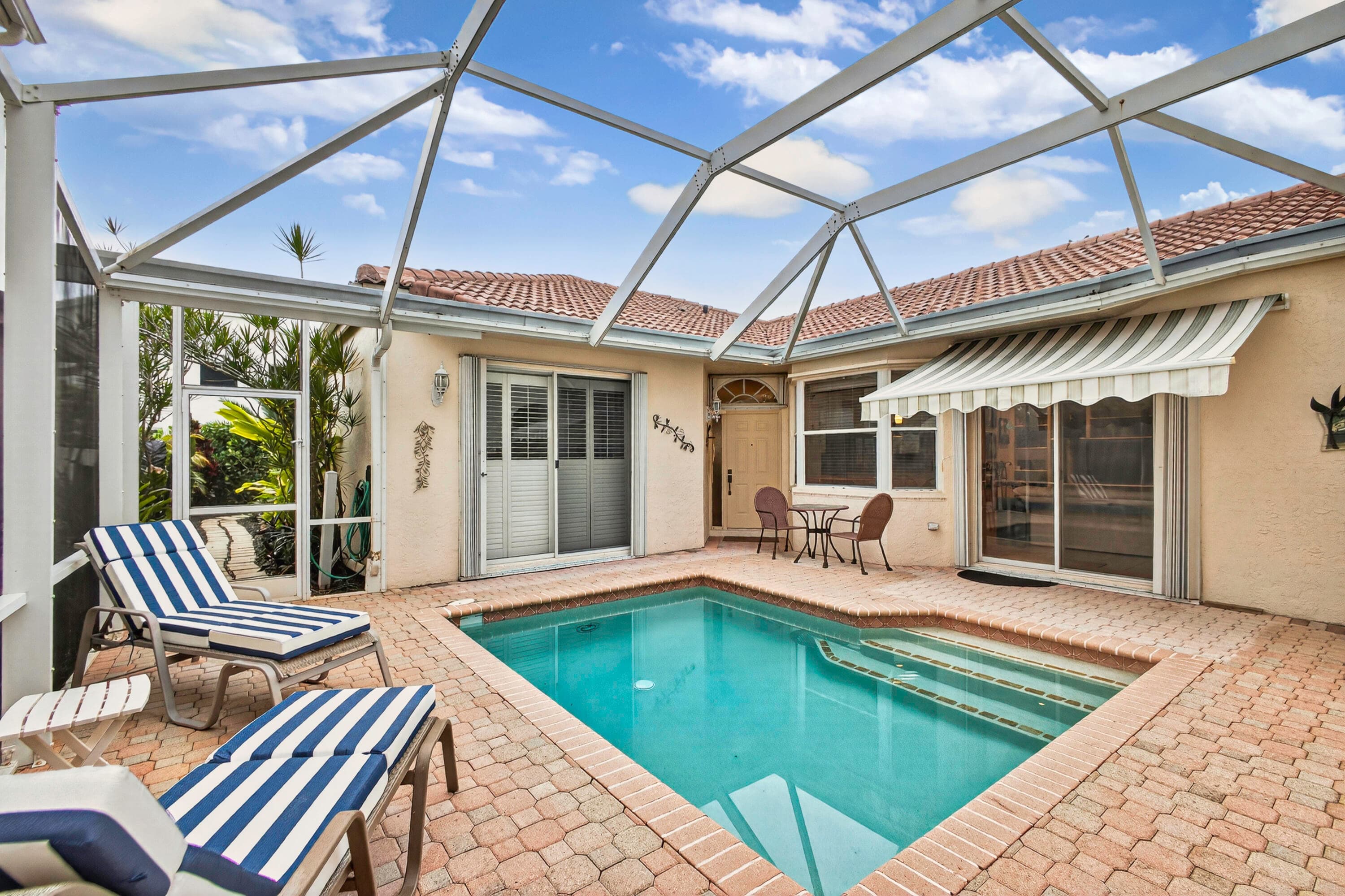 2085 Chagall Circle, West Palm Beach, FL 33409 — photo 1 of 46