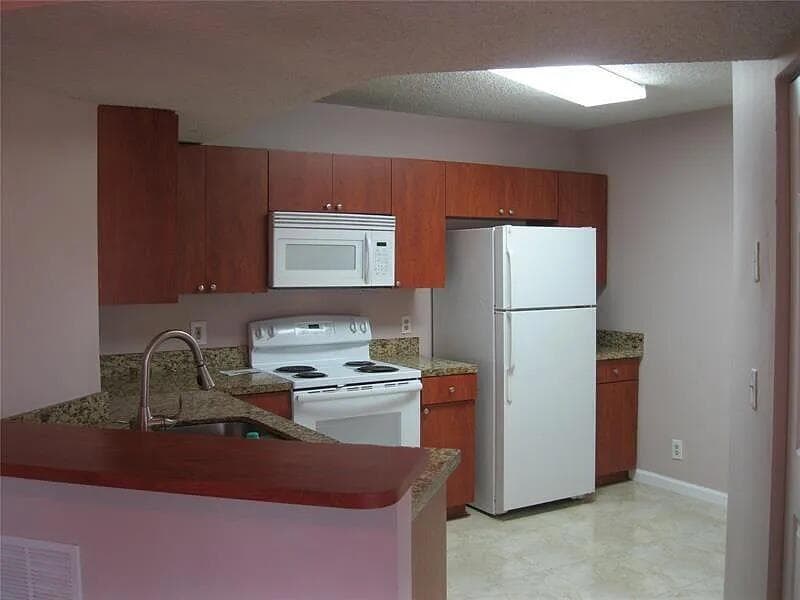 8781 Wiles Road 203, Coral Springs, FL 33067 — photo 6 of 22