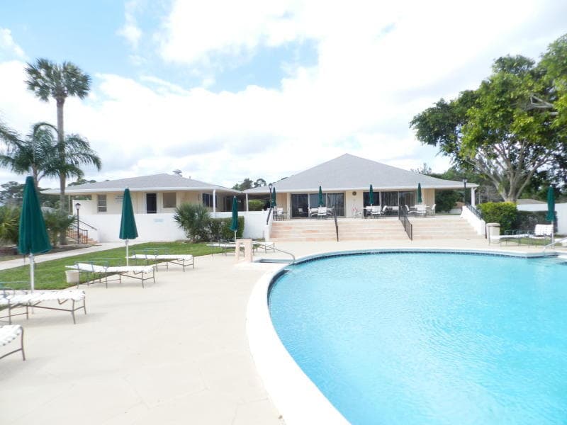 4 Greenway Village N 107, Royal Palm Beach, FL 33411 — photo 1 of 21
