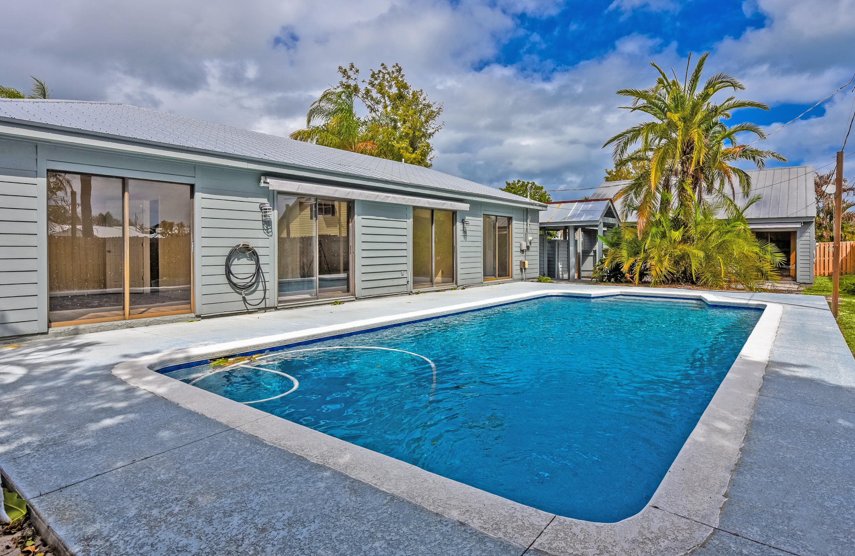 5666 SE Matousek Street, Stuart, FL 34997 — photo 1 of 49