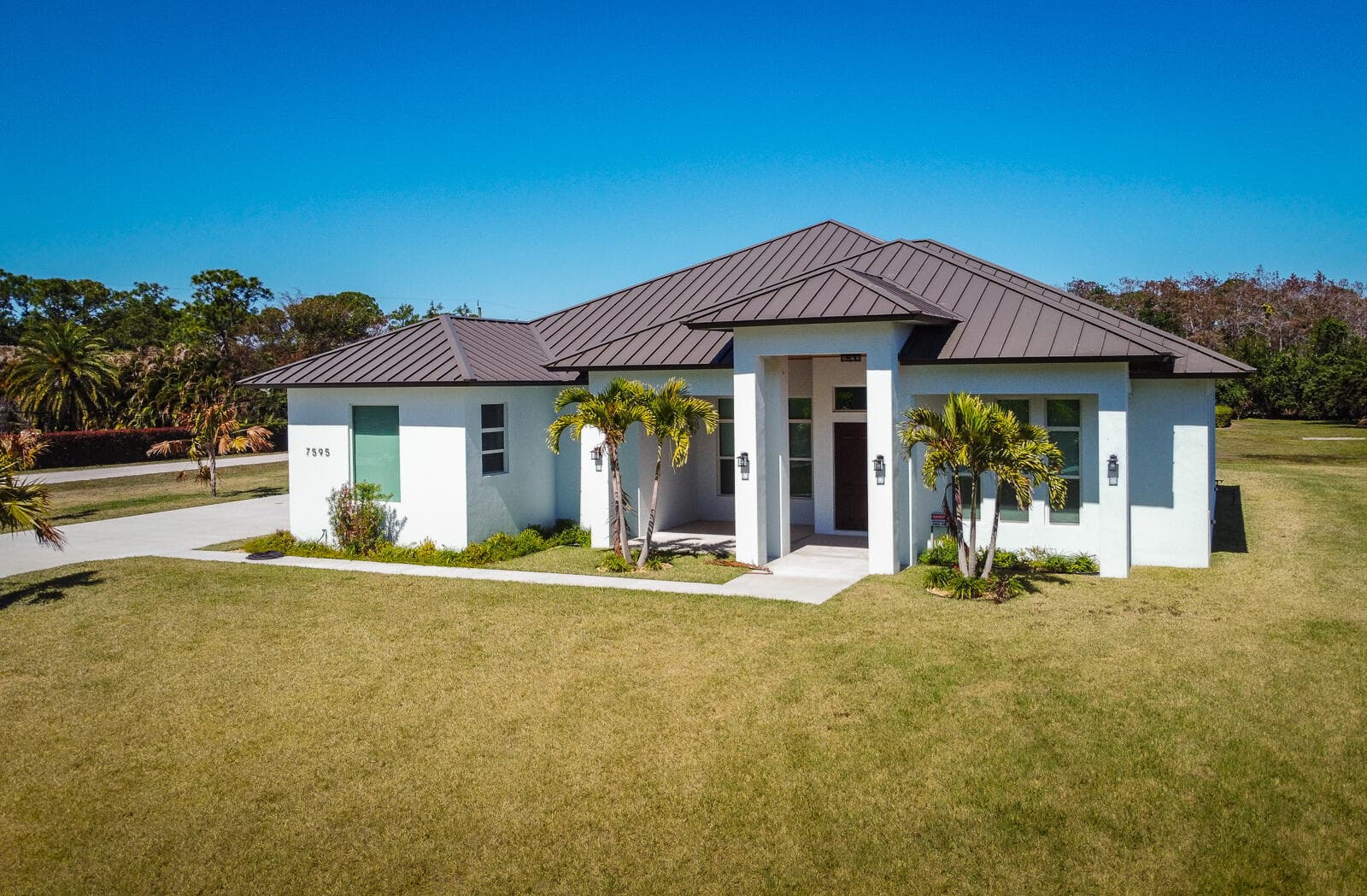 7595 155th Place N, Palm Beach Gardens, FL 33418 — photo 1 of 63