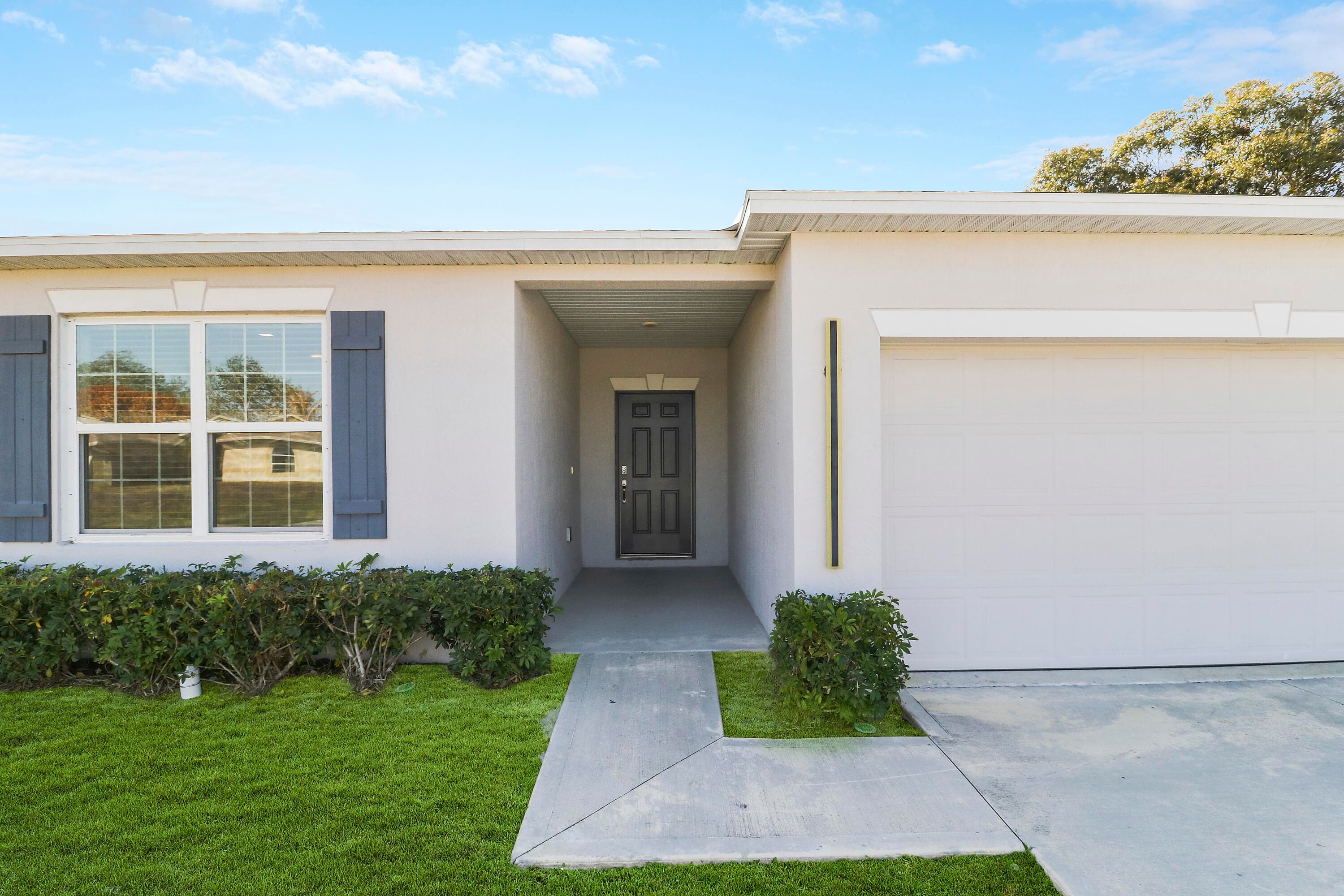 2120 SW Trenton, Port St. Lucie, FL 34984 — photo 2 of 40