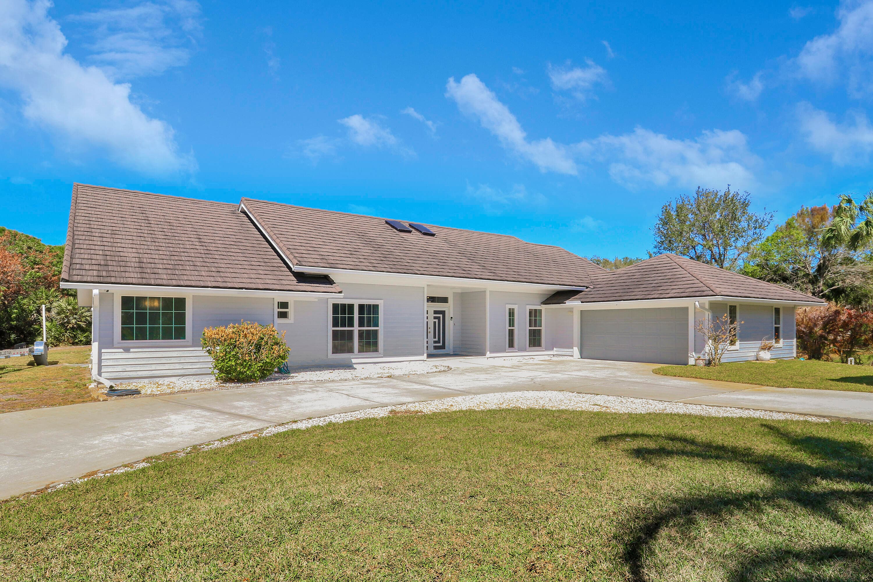 815 NE Stokes Terrace, Jensen Beach, FL 34957 — photo 3 of 45
