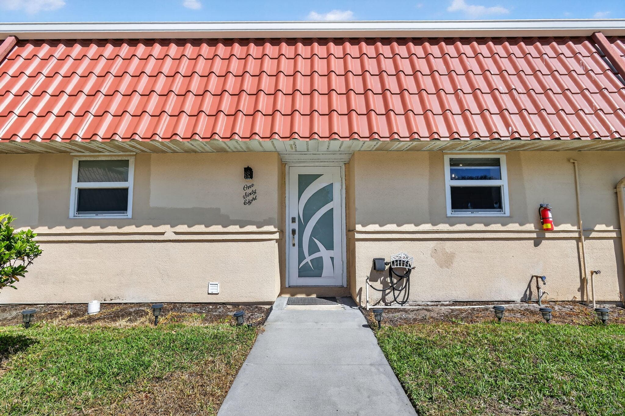 168 Amherst Lane, Lake Worth, FL 33467 — photo 1 of 52