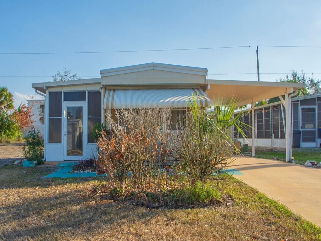 335 NE Tropicalia Lane, Jensen Beach, FL 34957 — photo 2 of 34