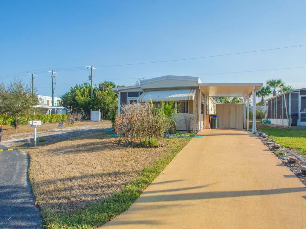 335 NE Tropicalia Lane, Jensen Beach, FL 34957 — photo 4 of 34