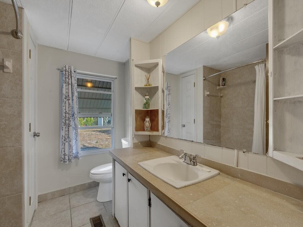 335 NE Tropicalia Lane, Jensen Beach, FL 34957 — photo 25 of 34