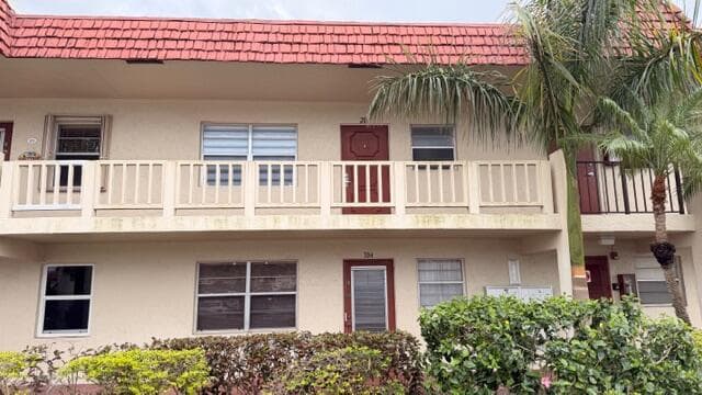 5 Abbey Lane 104, Delray Beach, FL 33446 — photo 1 of 20
