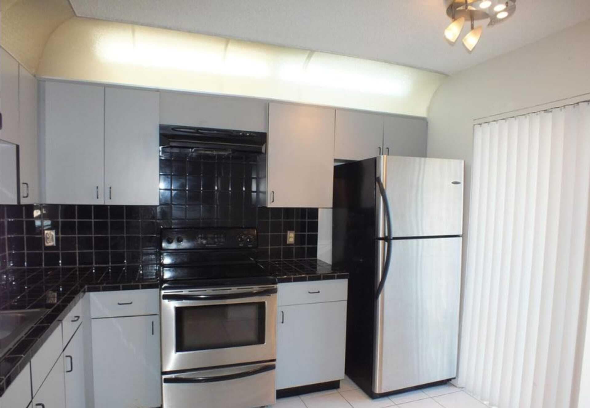 300 E Club Circle 201, Boca Raton, FL 33487 — photo 1 of 8