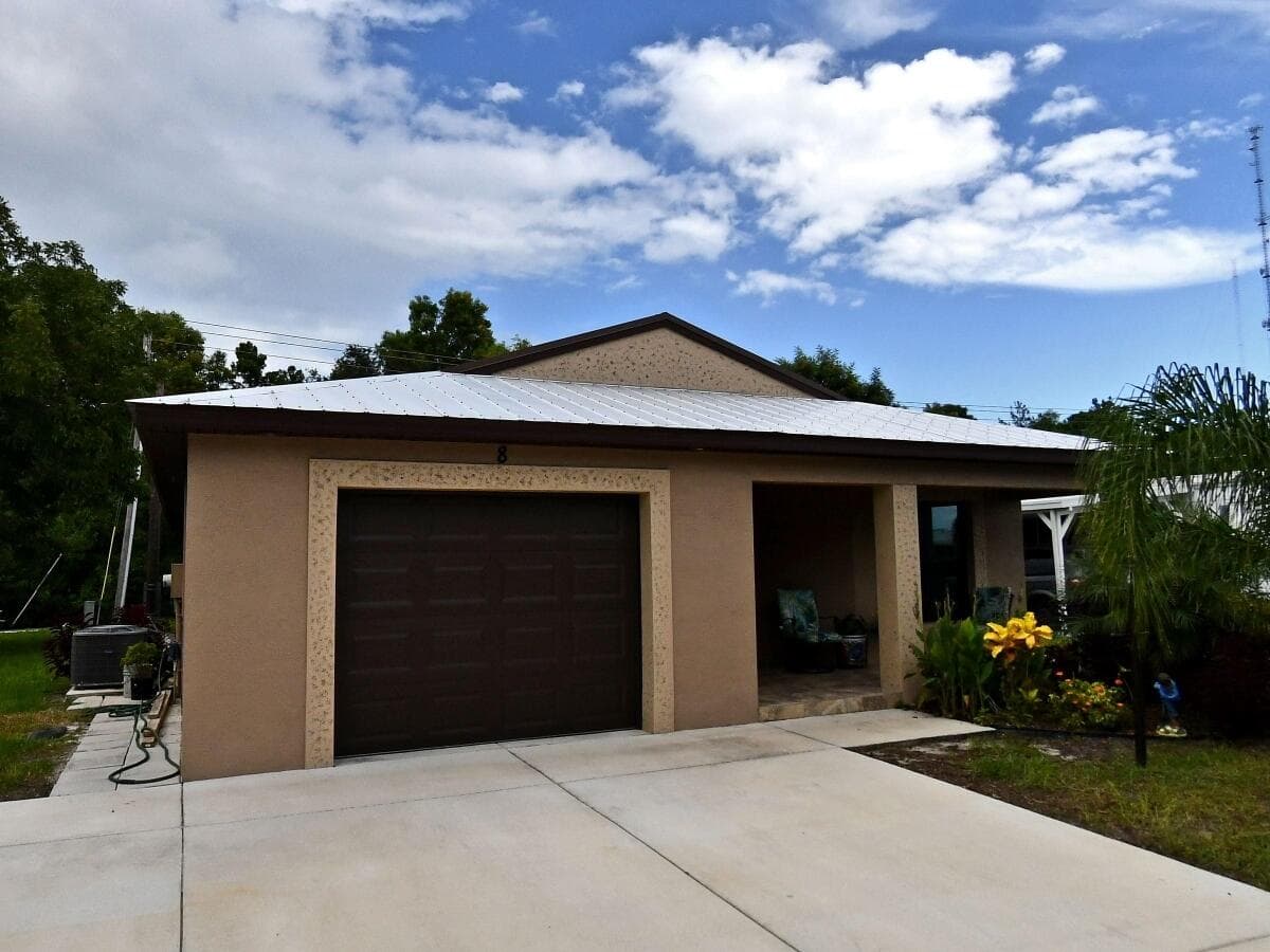8 Mediterranean Boulevard N, Port St. Lucie, FL 34952 — photo 1 of 14