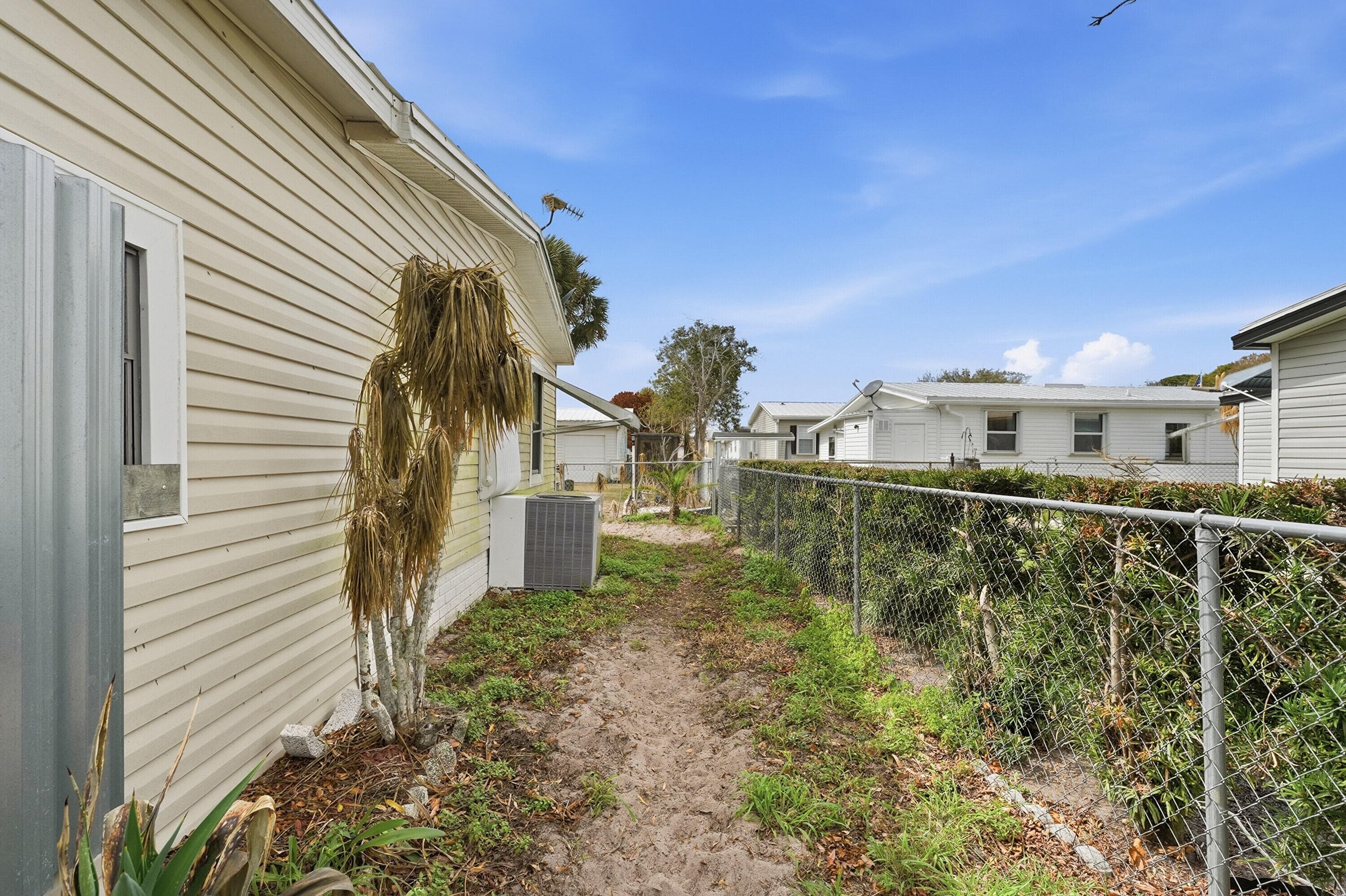 566 Dolphin Circle, Barefoot Bay, FL 32976 — photo 4 of 37